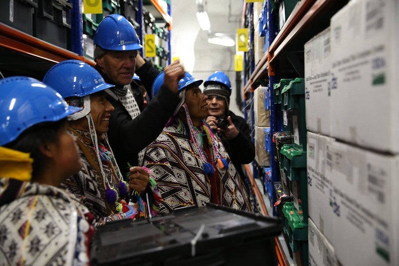 Representatives of indigenous Andean communities from Parque de la Papa, in Cusco, Peru, deposit seeds for long-term safekeeping at the Svalbard Global Seed Vault, Norway in 2015