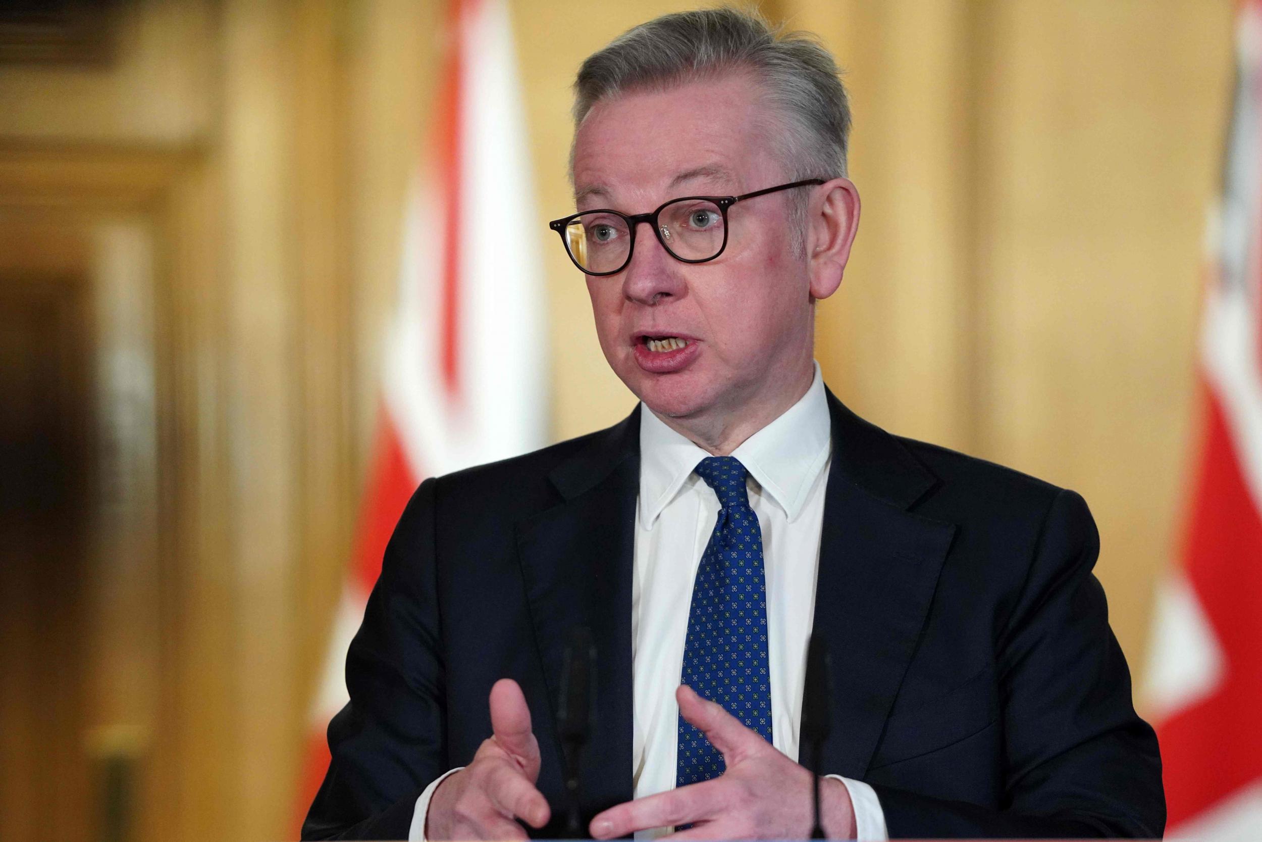 Gove speaks at the daily press conference (AFP/Getty)