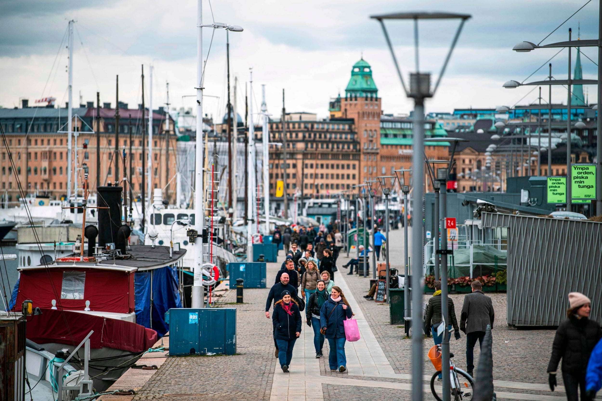 People walk at Strandvagen in Stockholm (AFP/Getty)