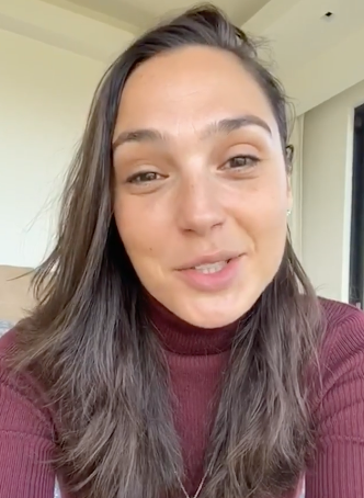 Gal Gadot in mid-flow as she leads an earnest rendition of 'Imagine'