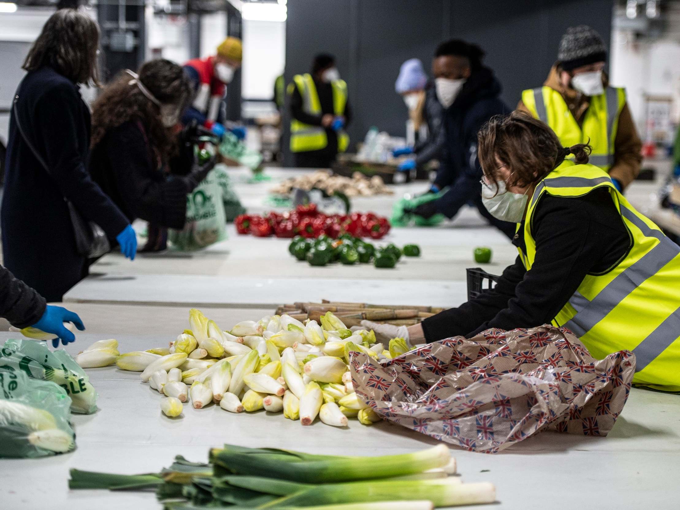 Food parcels being prepared by Haringey council volunteers at Tottenham Hotspur Stadium (Daniel Hambury/@stellapicsltd)