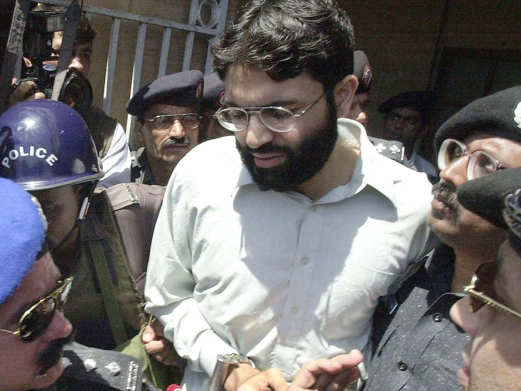 Omar Sheikh, pictured in 2002, has had his death sentence overturned for his role in Daniel Pearl's kidnapping and murder