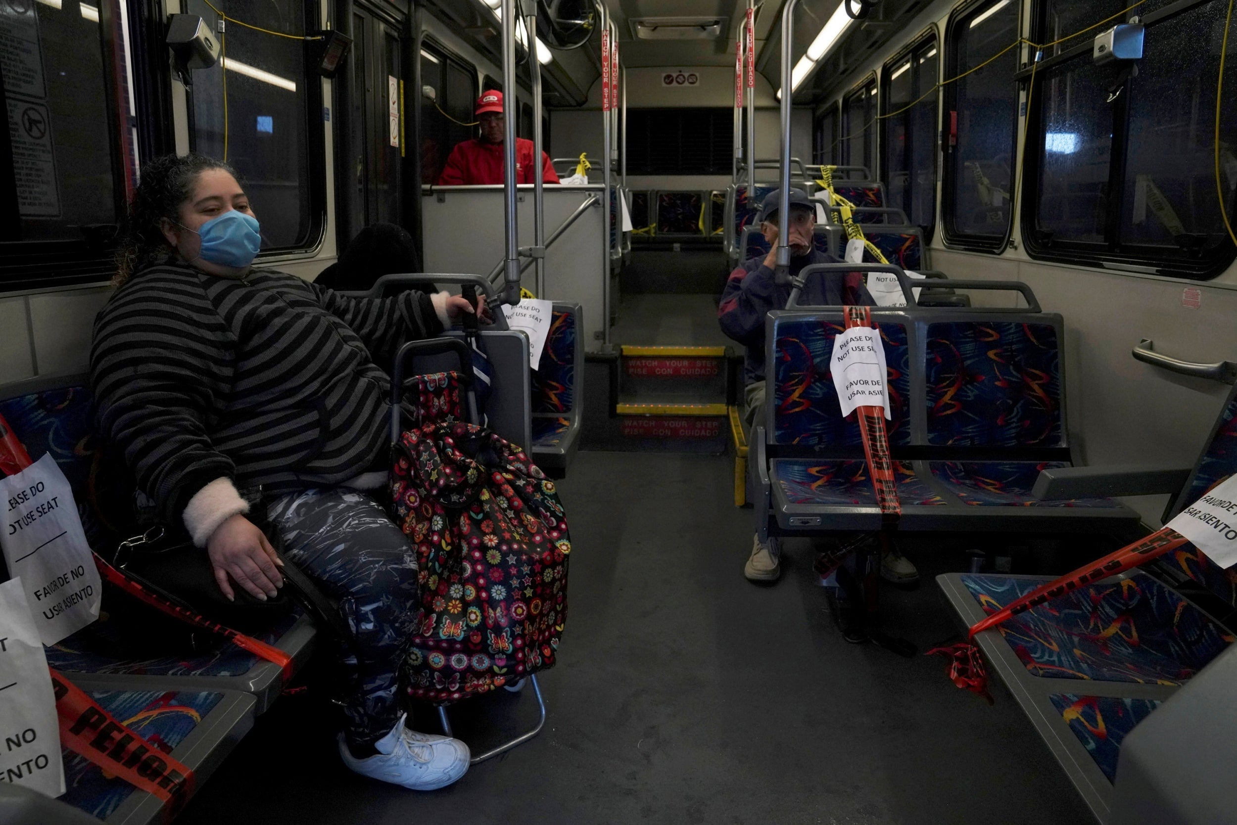 Riding the bus while masked in Laredo, Texas.