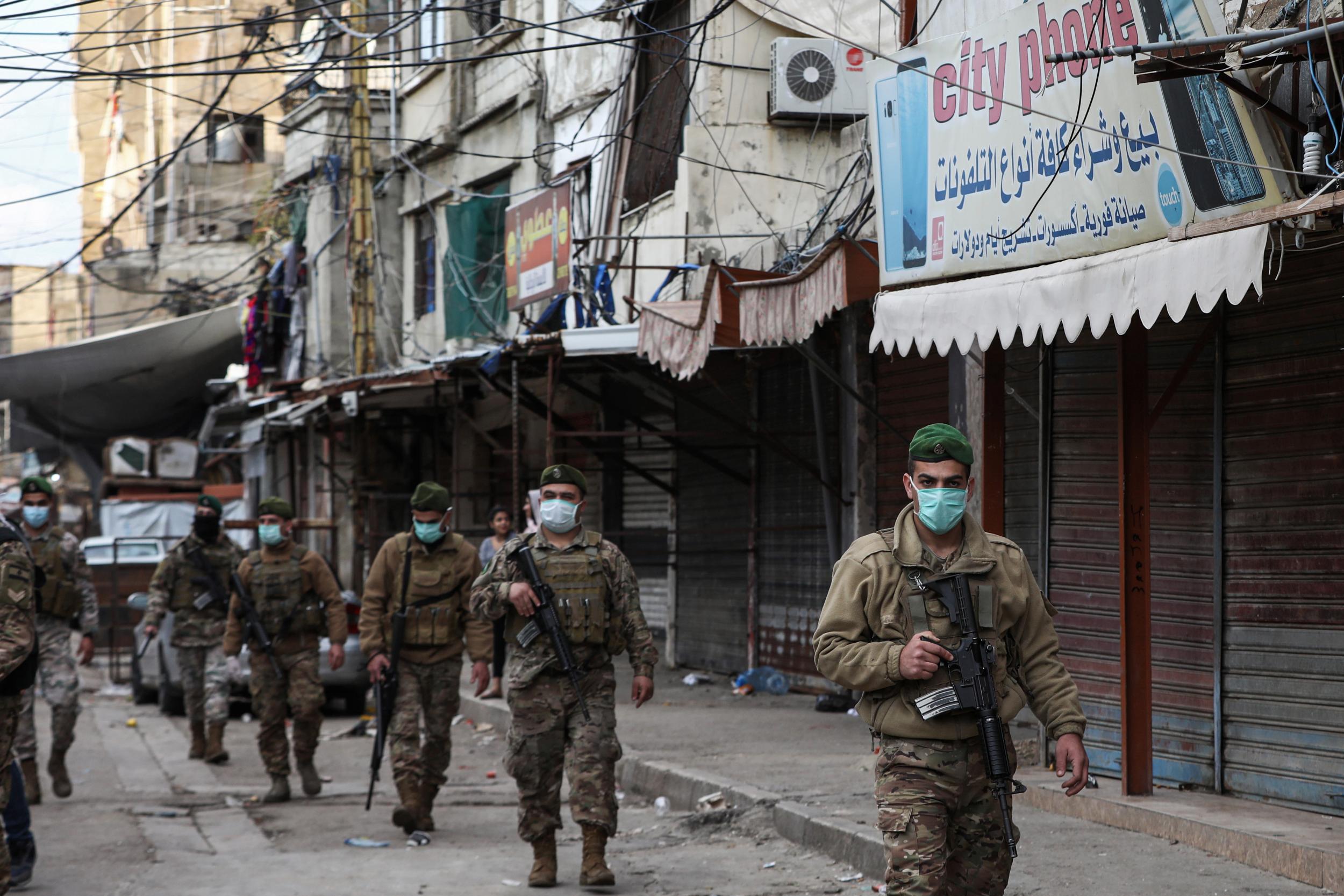 Lebanese army soldiers patrol the Sabra neighbourhood of Beirut where many Palestinian refugees still live (Photo by Anwar Amro/AFP)