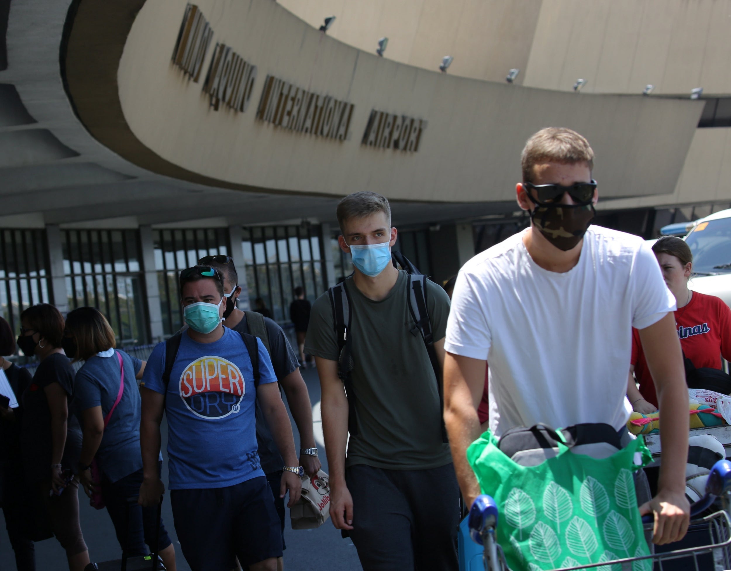 German nationals, pictured arriving for a repatriation flight at Ninoy Aquino International Airport, have to pay just €200