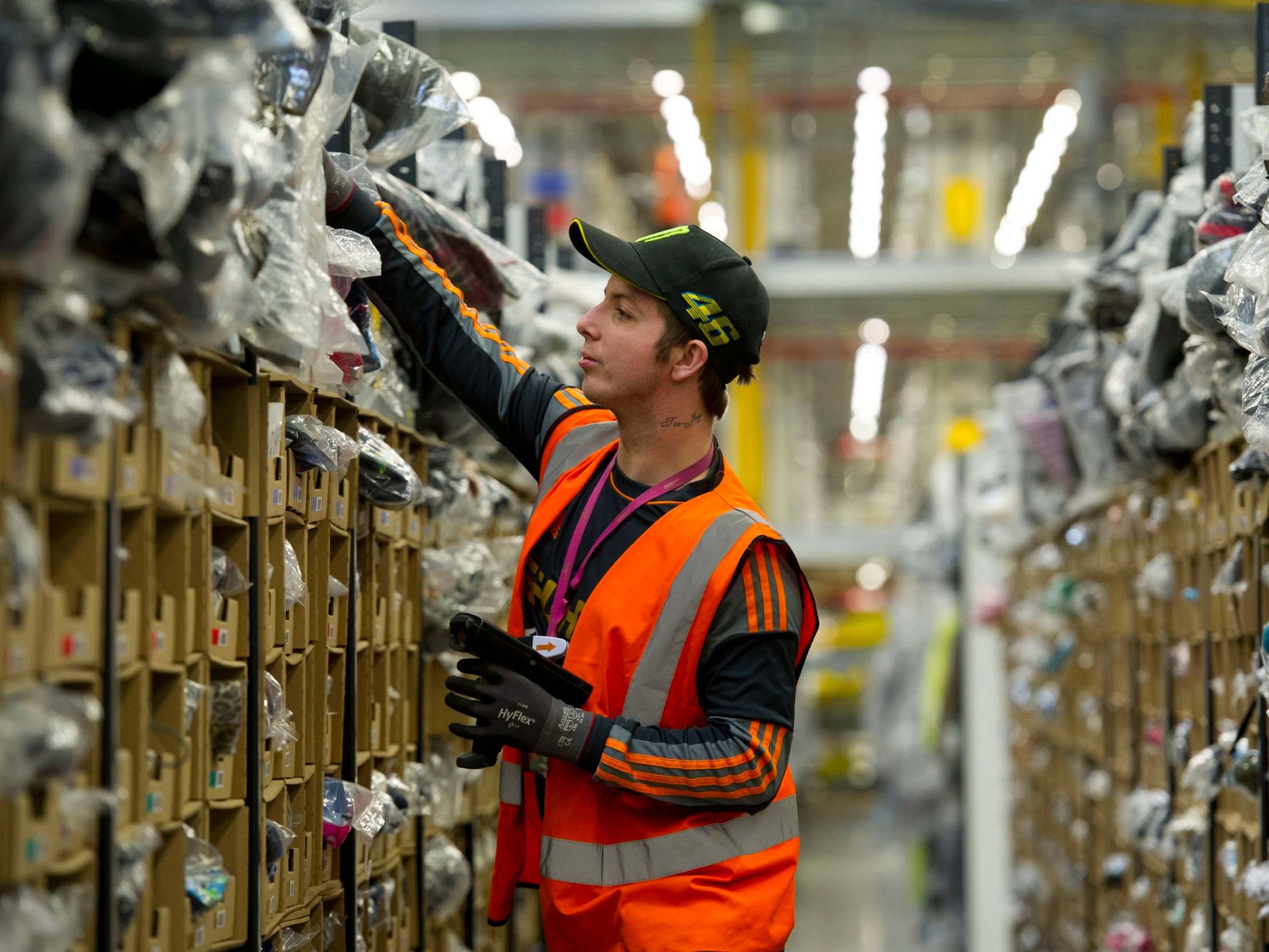 A worker at the Amazon fulfilment centre on Ffordd Amazon, Skewen