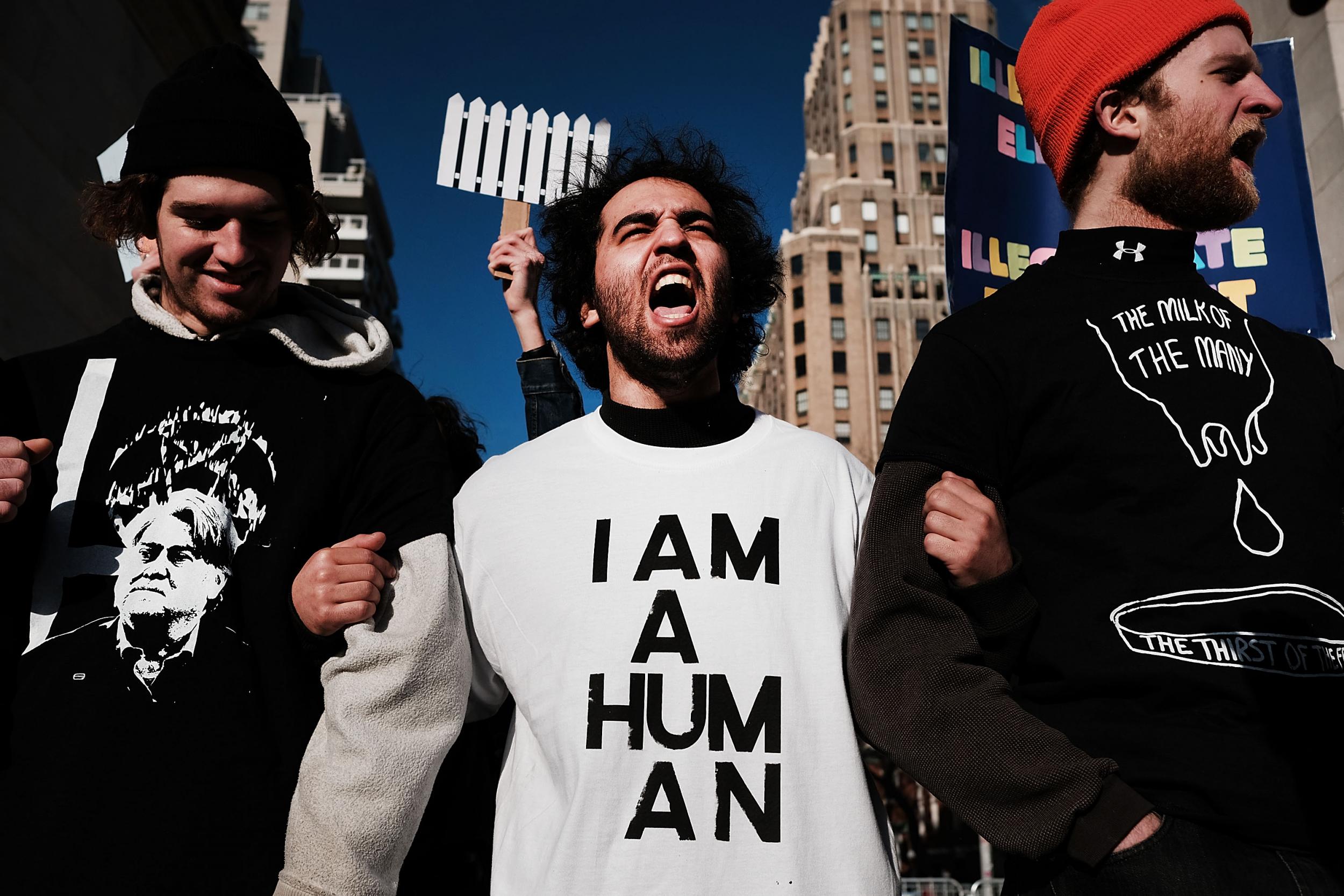 Protesters critical of Trump attend a rally in New York City to show solidarity with a general strike in Washington Square Park in February (Getty)