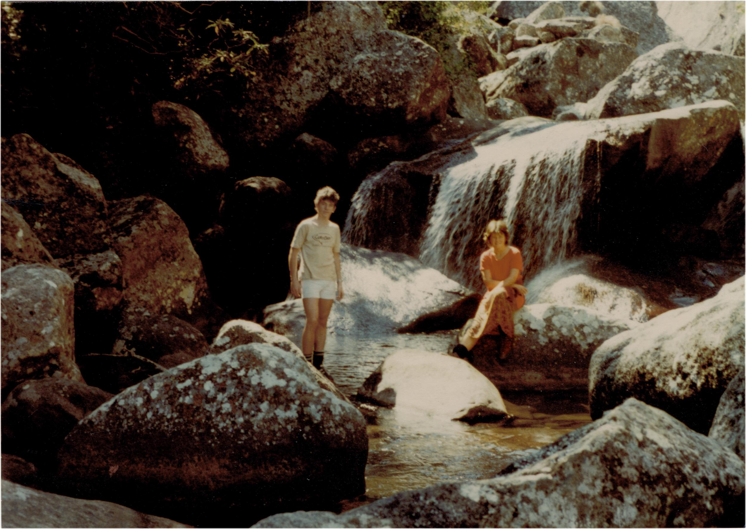 Looking cool: the writer and her brother taking a rest from the climb