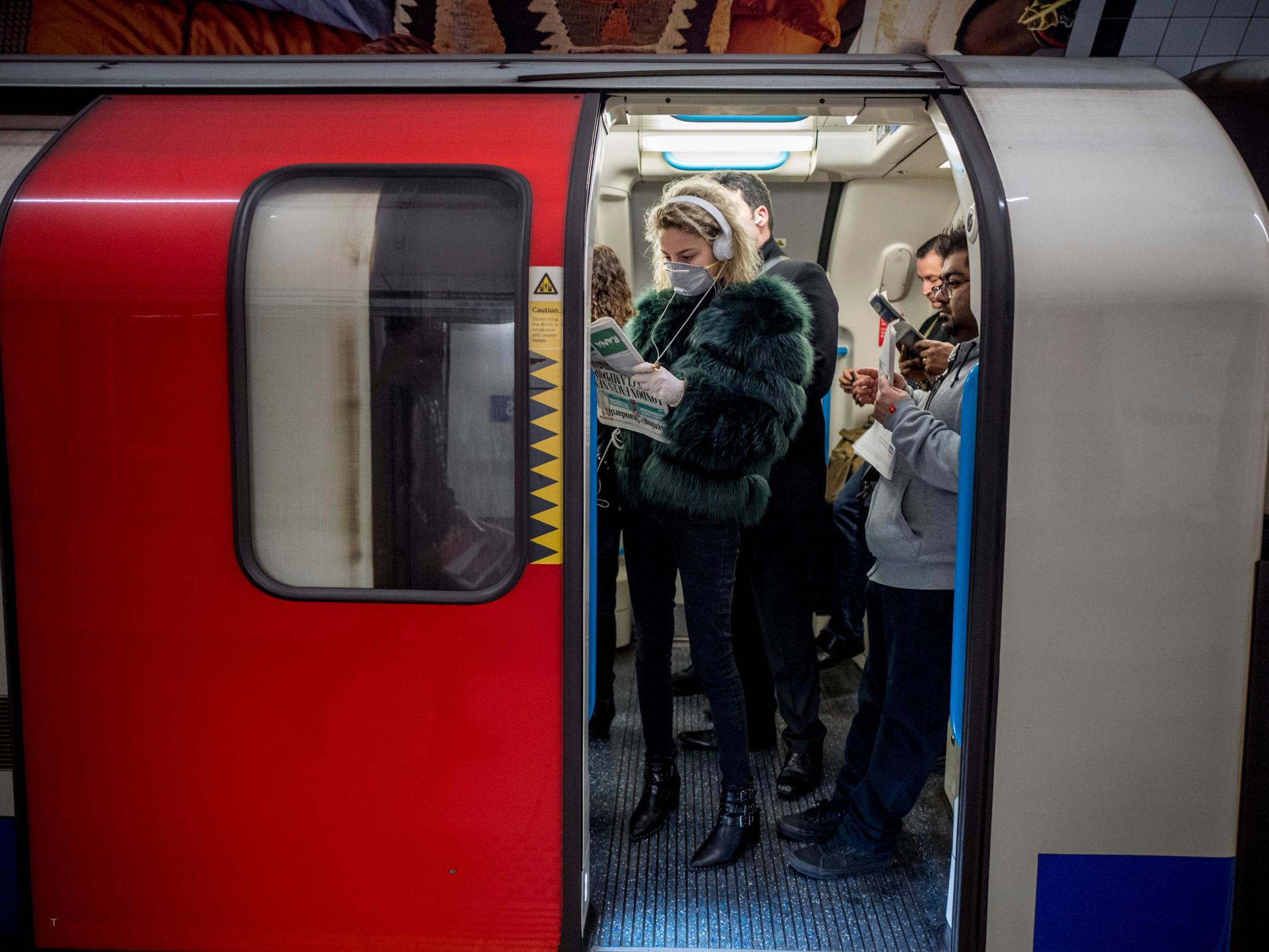 Passengers on London Underground are still commuting at unsafe distances (AFP/Getty)