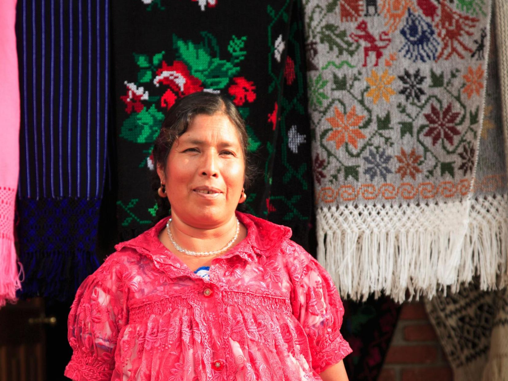 A seller with her knitted wares near the town of Angahuan, one of the many places to find beautiful objects