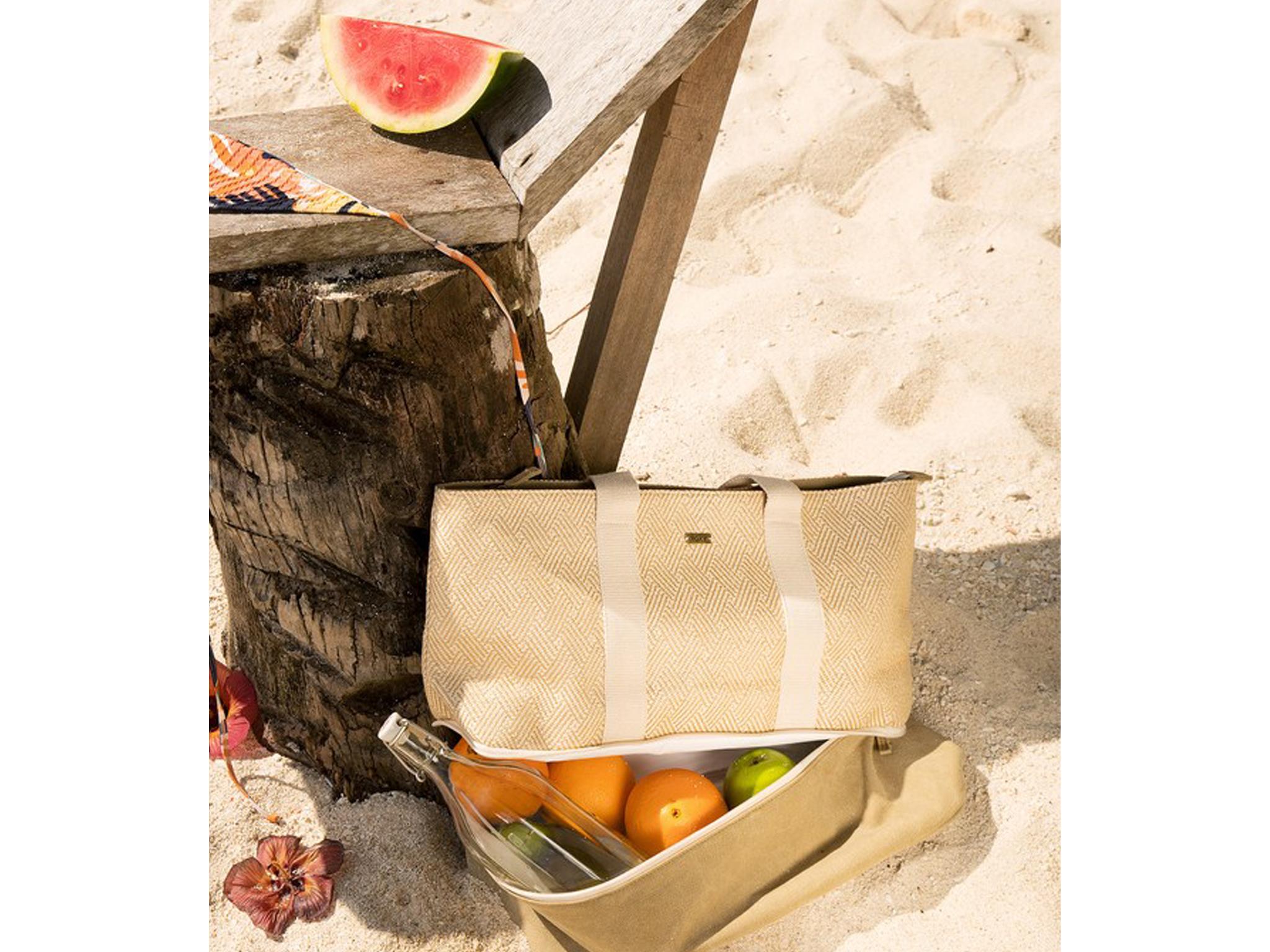 This cleverly designed bag can carry both your bikini and bottles of rum (Roxy)