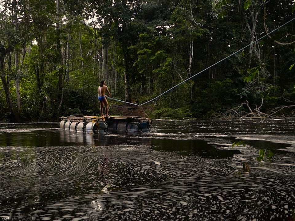 Michael McGarrell of COICA on a pontoon in Patamona Nation territory, Guyana