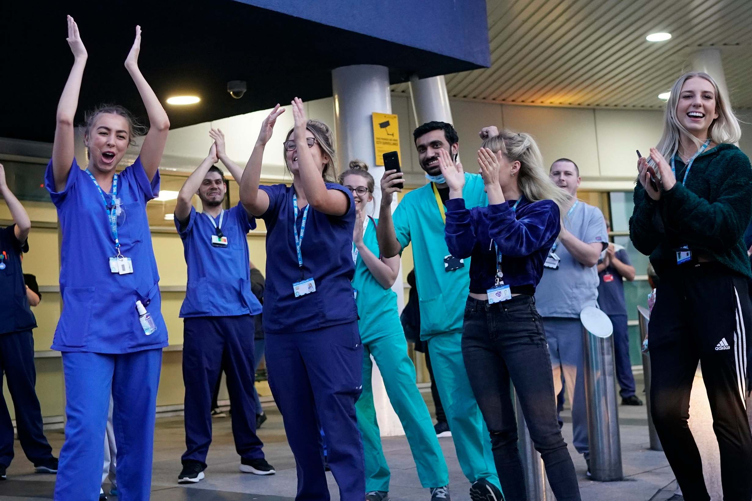 NHS staff at the entrance of the Royal Liverpool Hospital yesterday