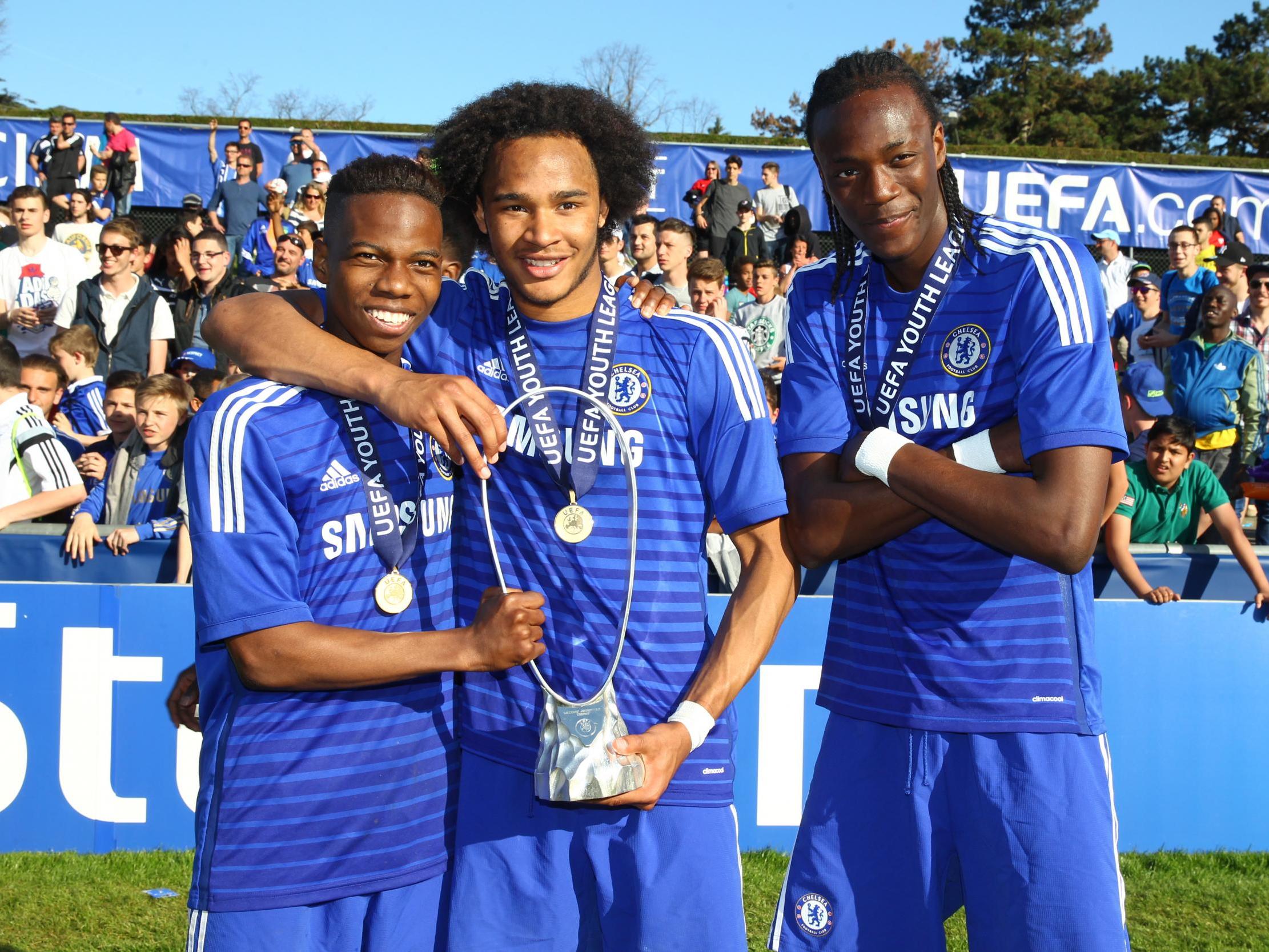 Charly Musonda, Izzy Brown and Tammy Abraham pose with the Uefa Youth League trophy in 2015