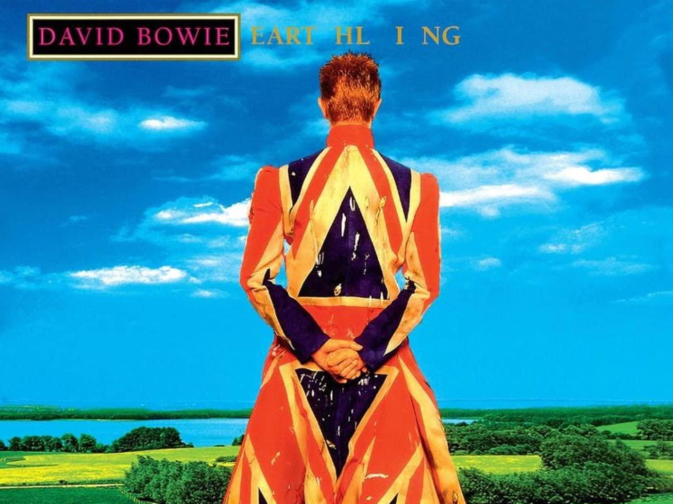 The cover art for ‘Earthling’ featured Bowie looking over a serene British landscape