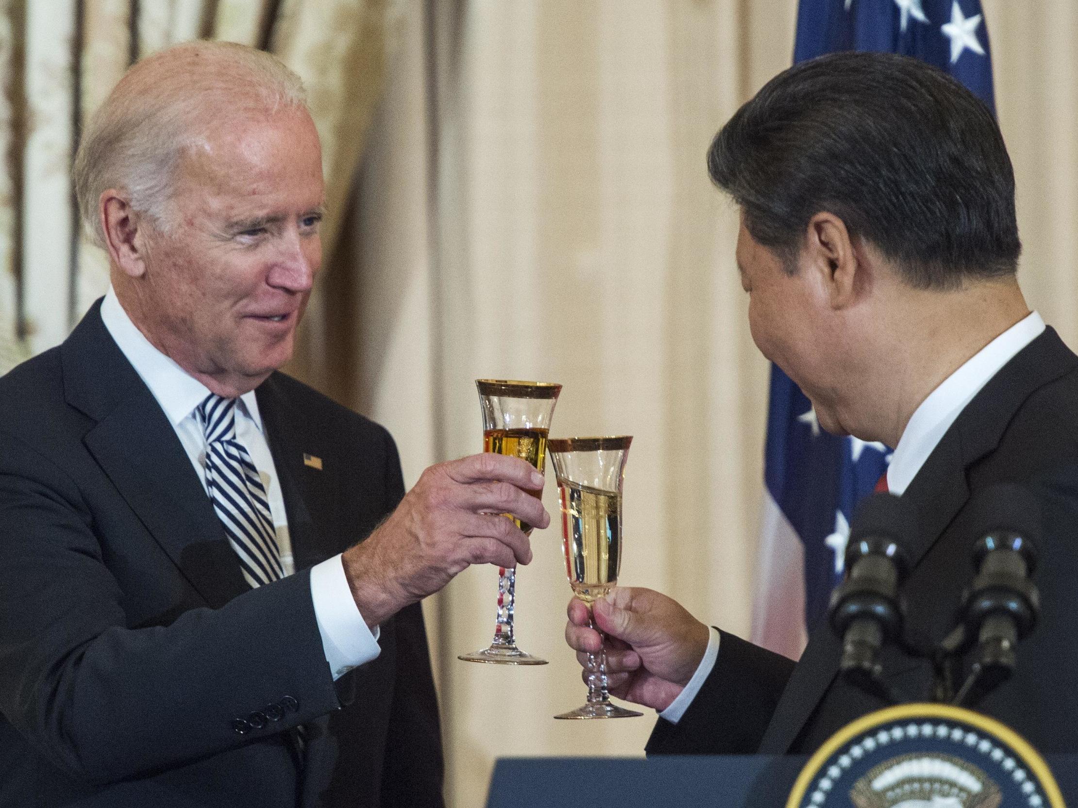 Then Vice President Joe Biden and President Xi Jinping toast during a state luncheon for China on 25 September 2015 in Washington DC