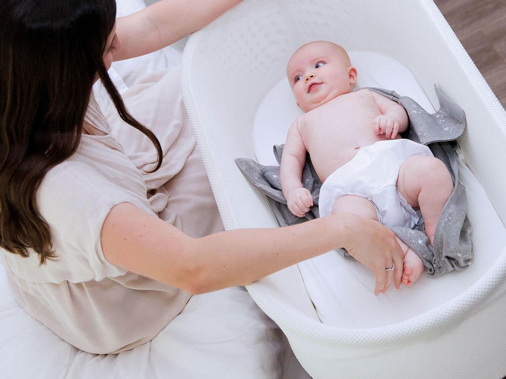 The cot makers claim it teaches your baby to become a better sleeper (Snoo)