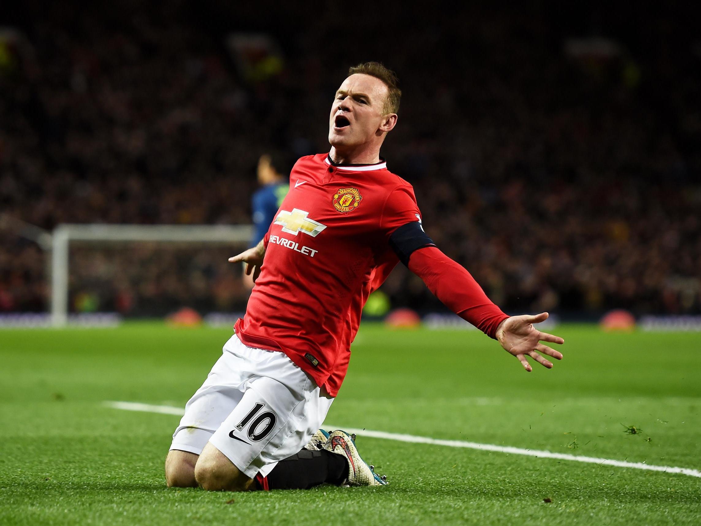 Wayne Rooney celebrates scoring against Arsenal in 2015