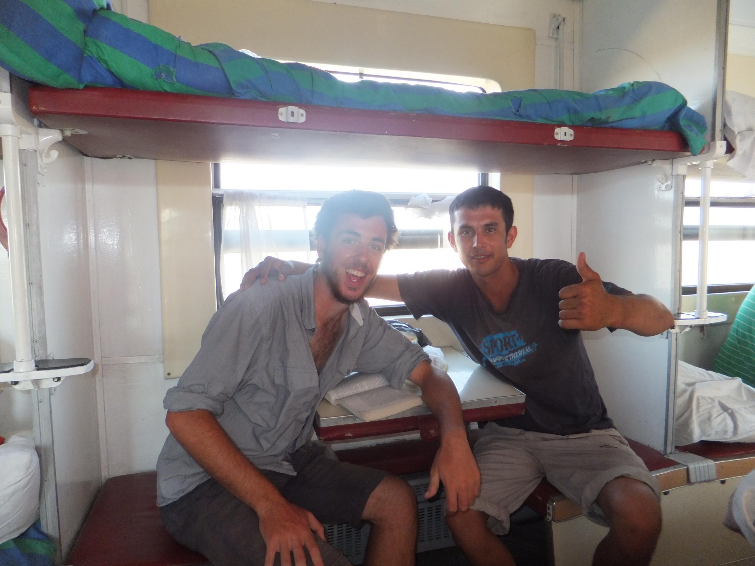 Rory (left) with a friend he made on the 24-hour train from Nukus to Tashkent