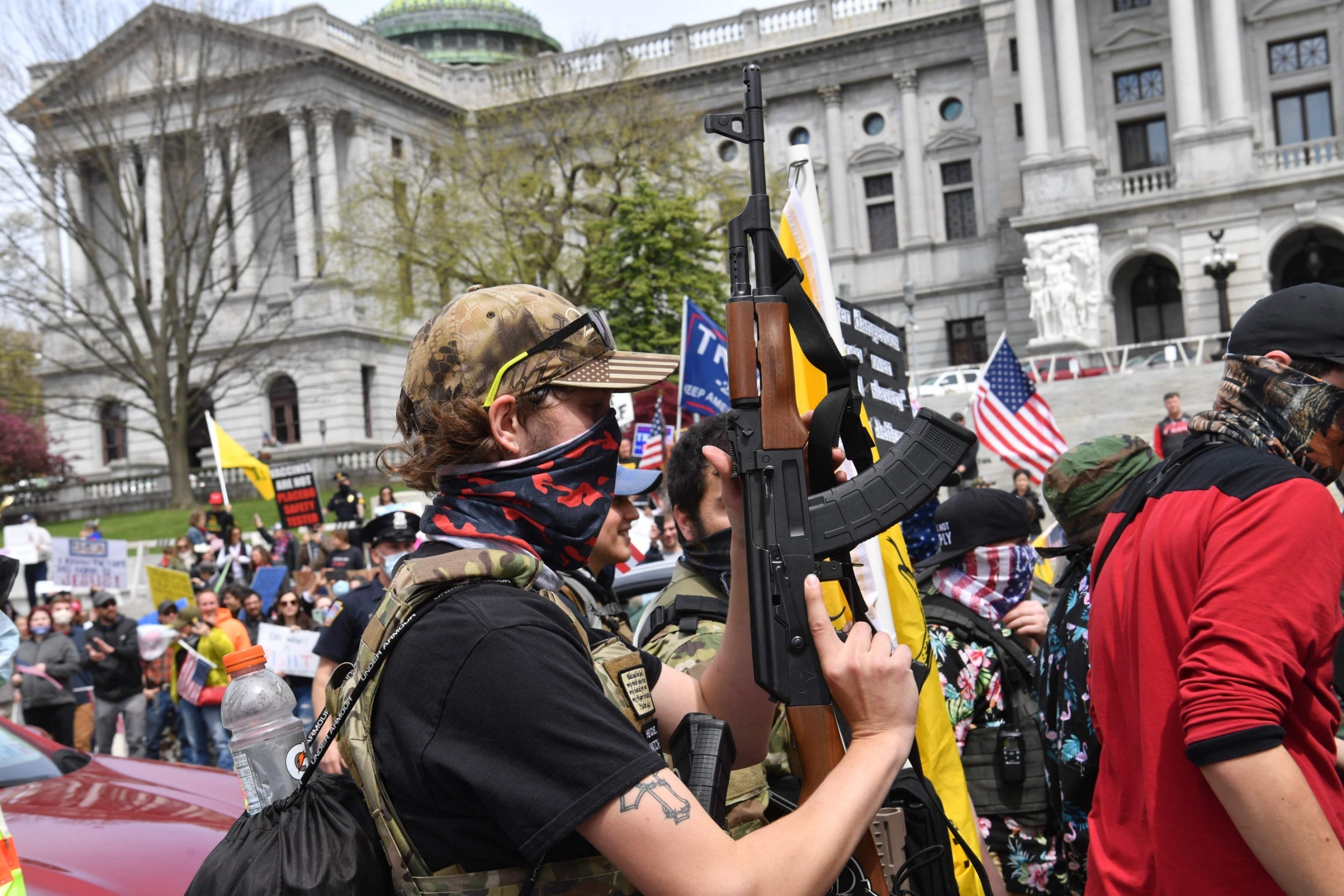 Armed protesters demonstrate against coronavirus lockdown orders in Harrisburg, Pennsylvania