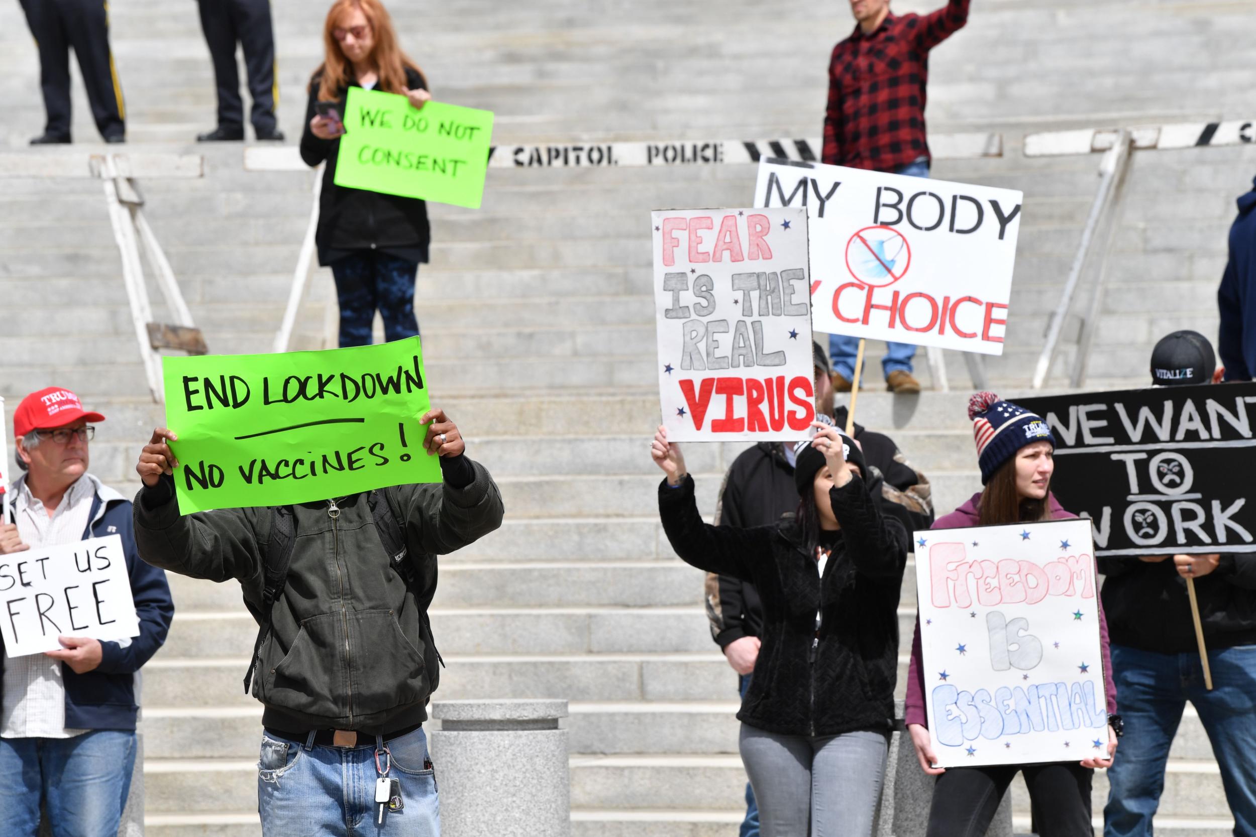 People take part in a ‘reopen Pennsylvania’ demonstration in Harrisburg, Pennsylvania on Monday