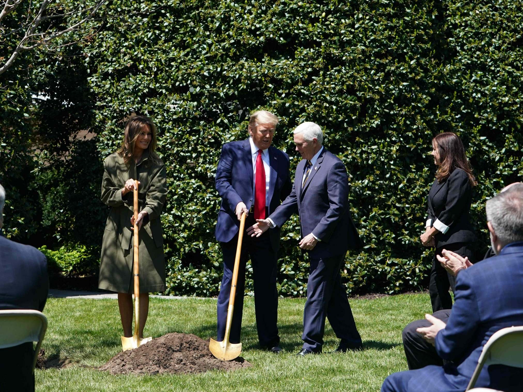 First Lady Melania Trump, President Trump, Vice President Mike Pence and Karen Pence participate in a tree planting ceremony to mark Earth Day and Arbor Day at the White House on 22 April 22, 2020