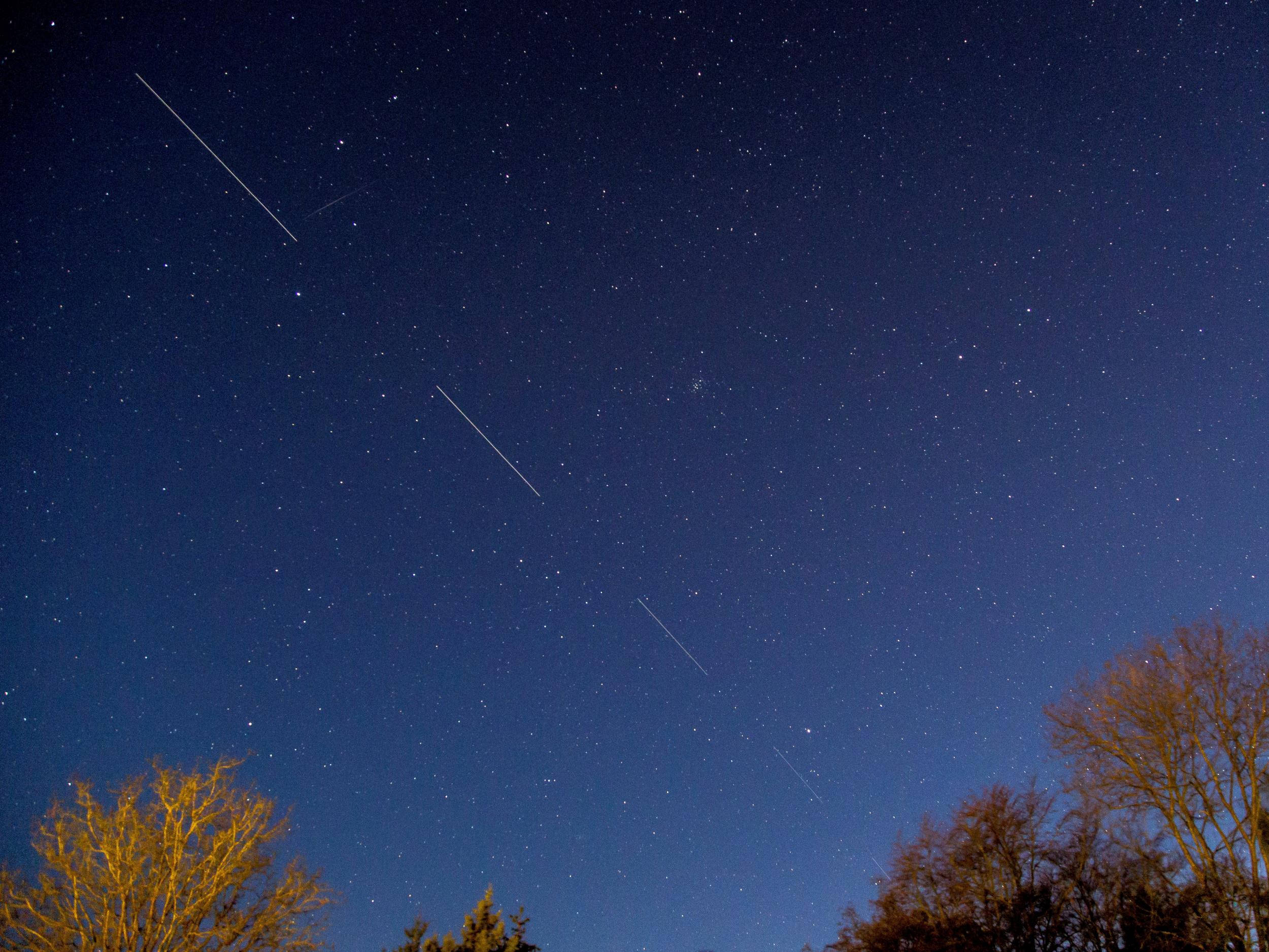 SpaceX Starlink satellites are pictured in the sky seen from Svendborg on South Funen, Denmark 21 April, 2020