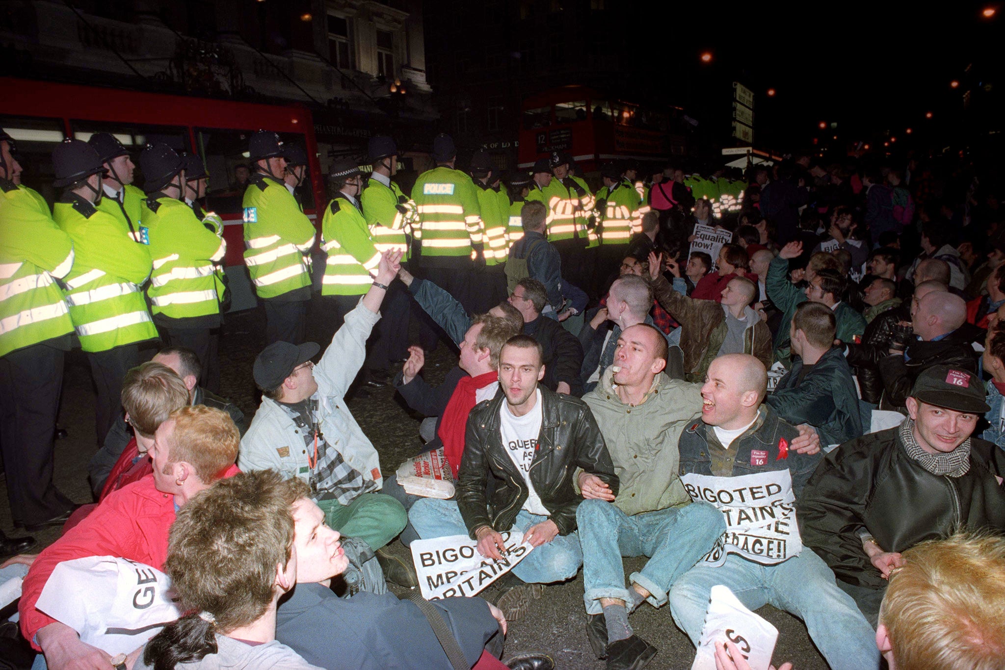 Militant gay rights group OutRage! brings traffic to a standstill in Haymaket, London