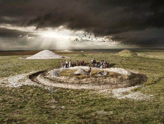 This artist's impression shows a funeral ceremony at an Early Bronze Age burial enclosure