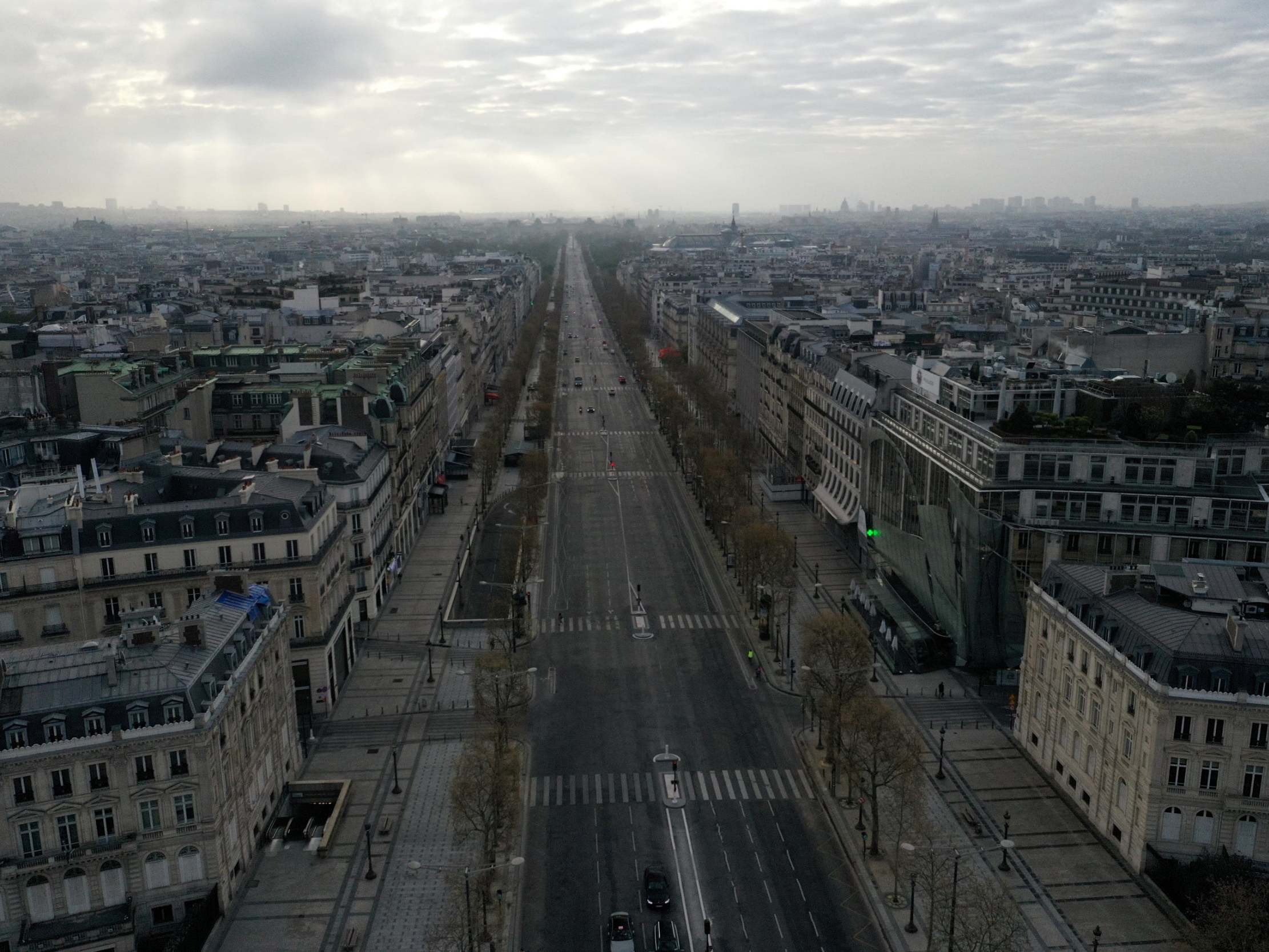 An aerial view shows the deserted Champs-Elysee Avenue in Paris during a lockdown imposed to slow the spread of the coronavirus disease earlier this month REUTERS/Pascal Rossignol/File Photo)