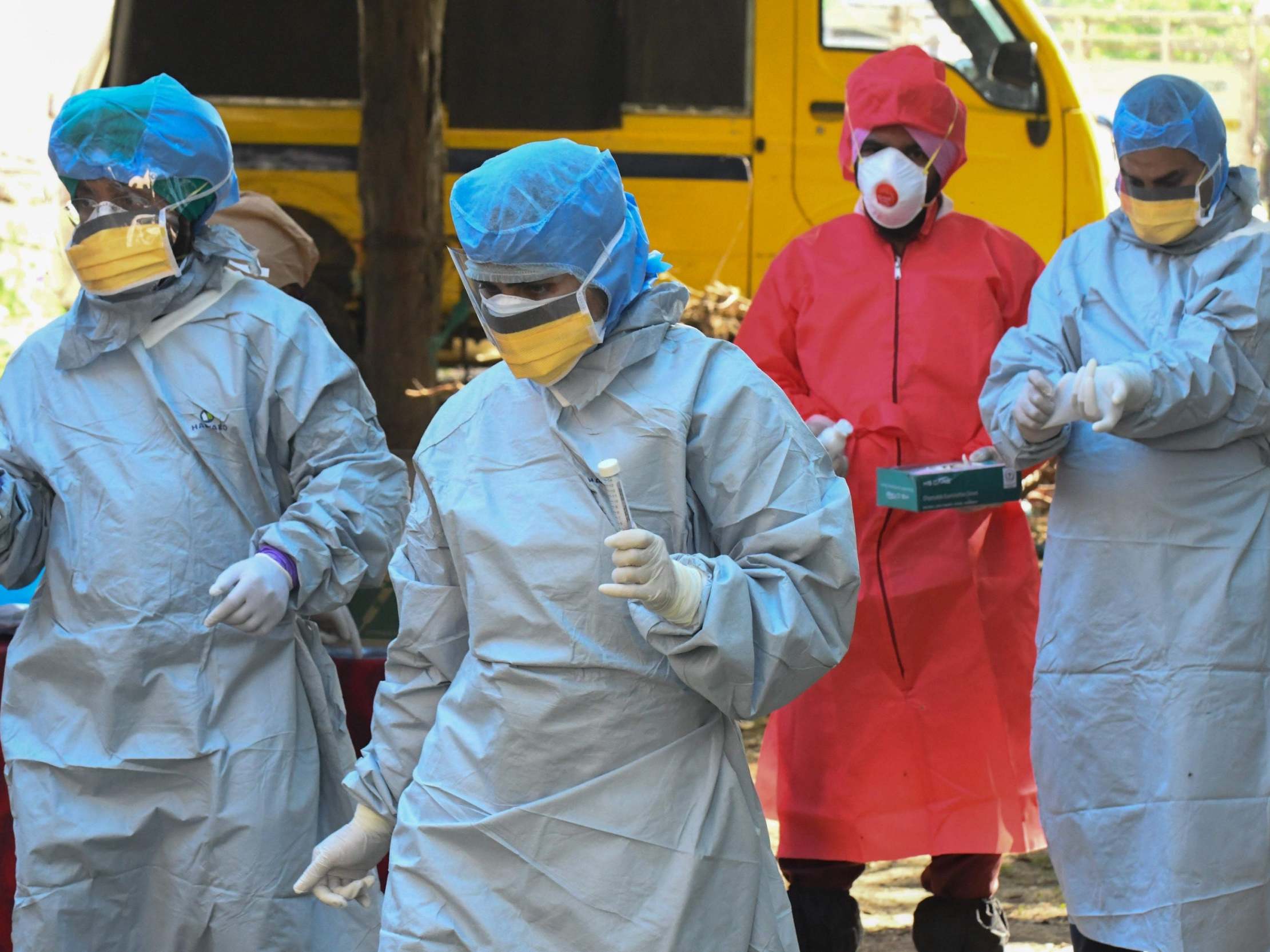 Doctors prepare to take samples for Covid-19 tests in Amritsar, northern India, on Thursday