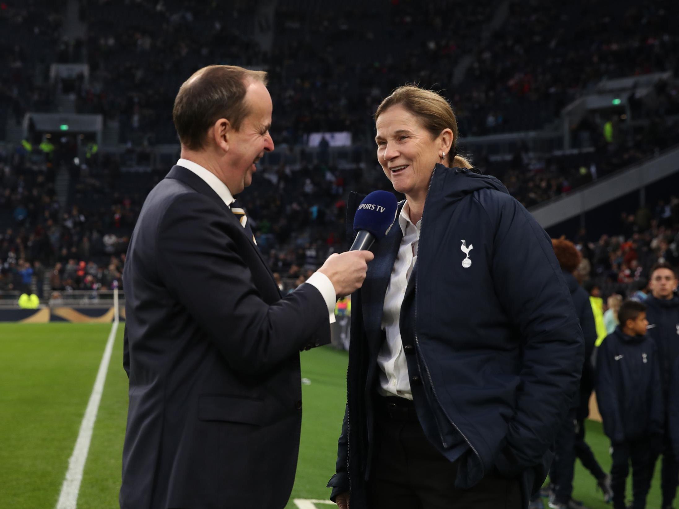 Tottenham announcer Paul Coyte speaks to US World Cup-winning coach Jill Ellis