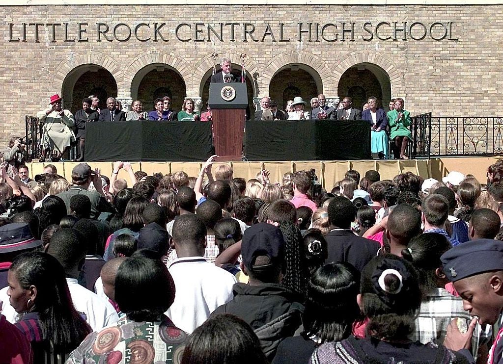 Bill Clinton at the Central High School in Arkansas (Getty)