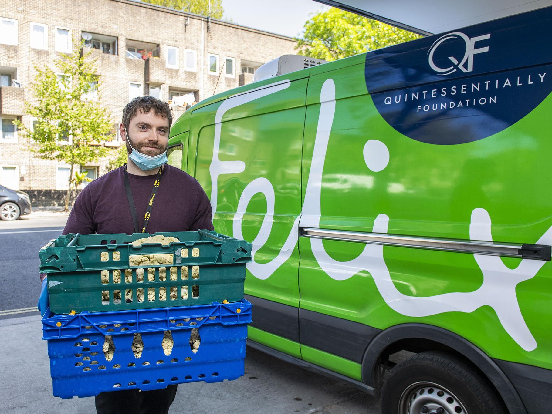 James Quayle, manager at North Paddington Food Bank, accepts a food delivery from The Felix Project
