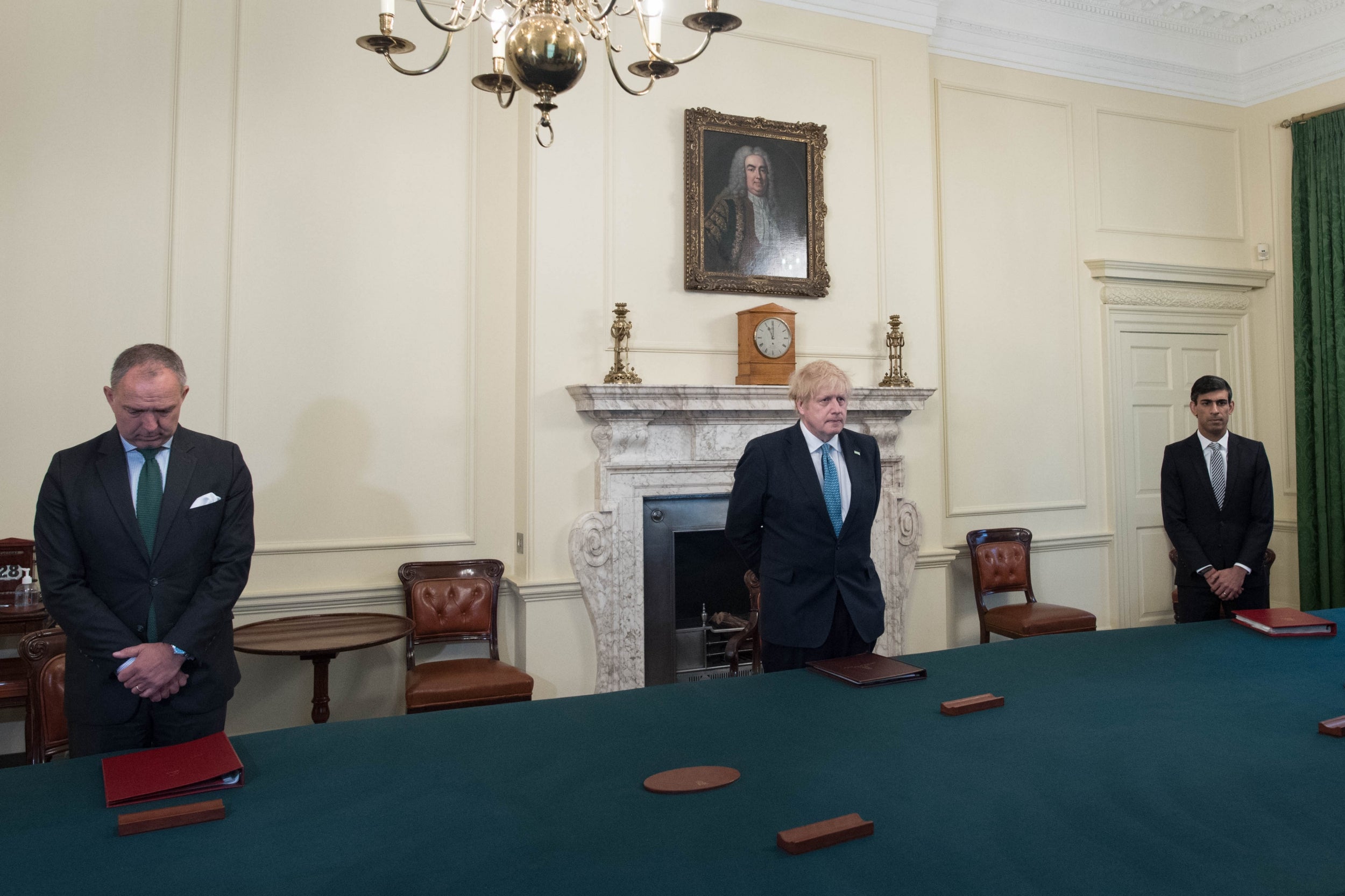 Boris Johnson and Rishi Sunak observe the minute's silence for frontline workers in Downing Street