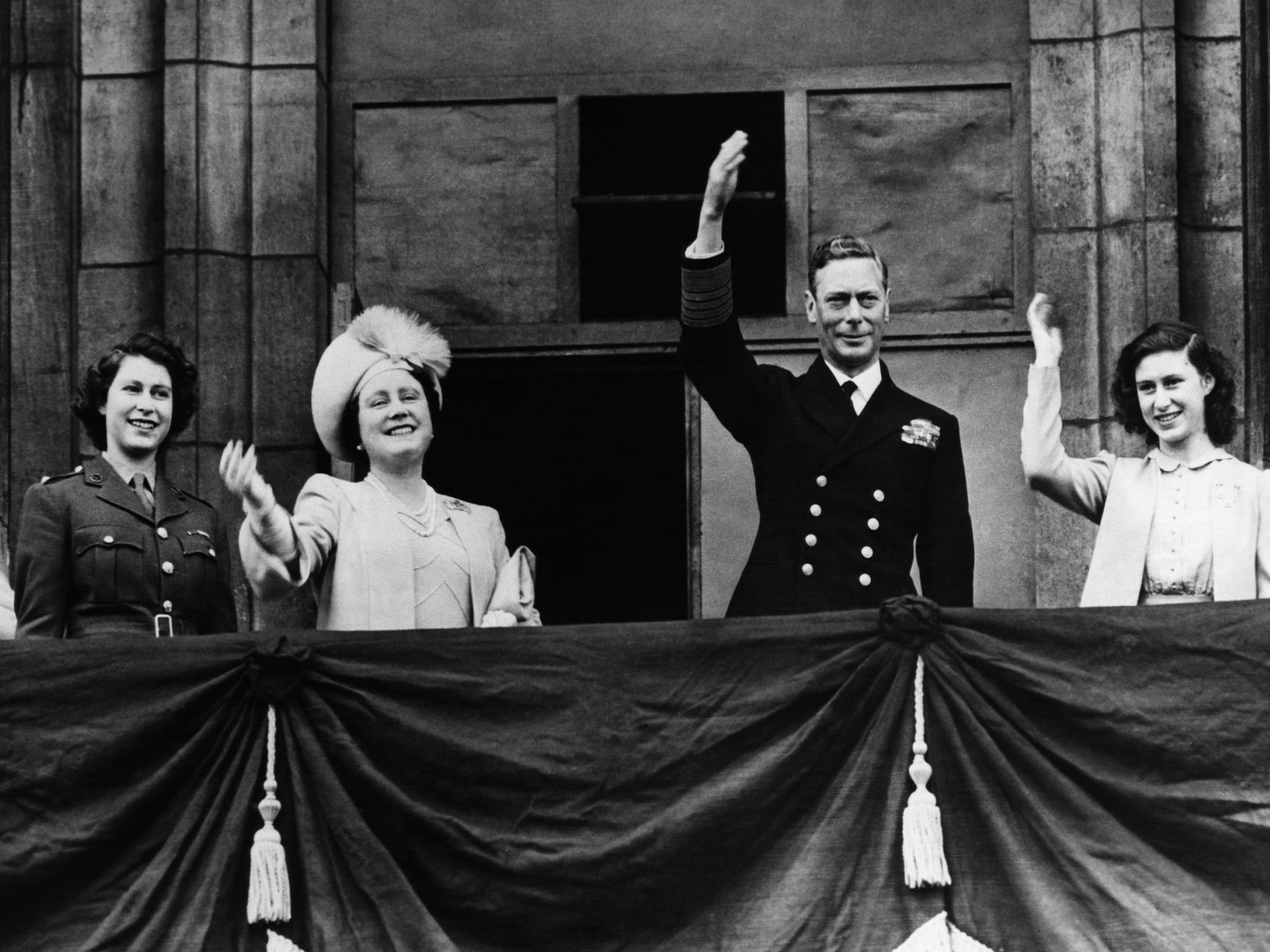 Princess Elizabeth, Queen Elizabeth, King George VI and Princess Margaret on the balcony of Buckingham Palace on VE Day, 8 May 1945