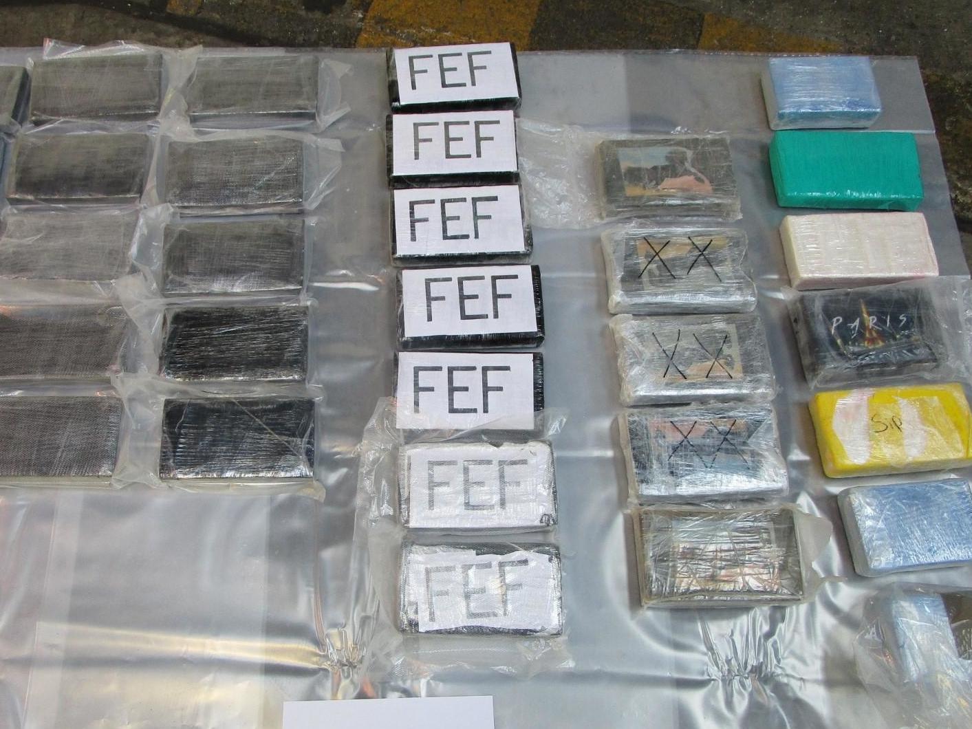 An estimated 82 kilos and three kilos of heroin were discovered