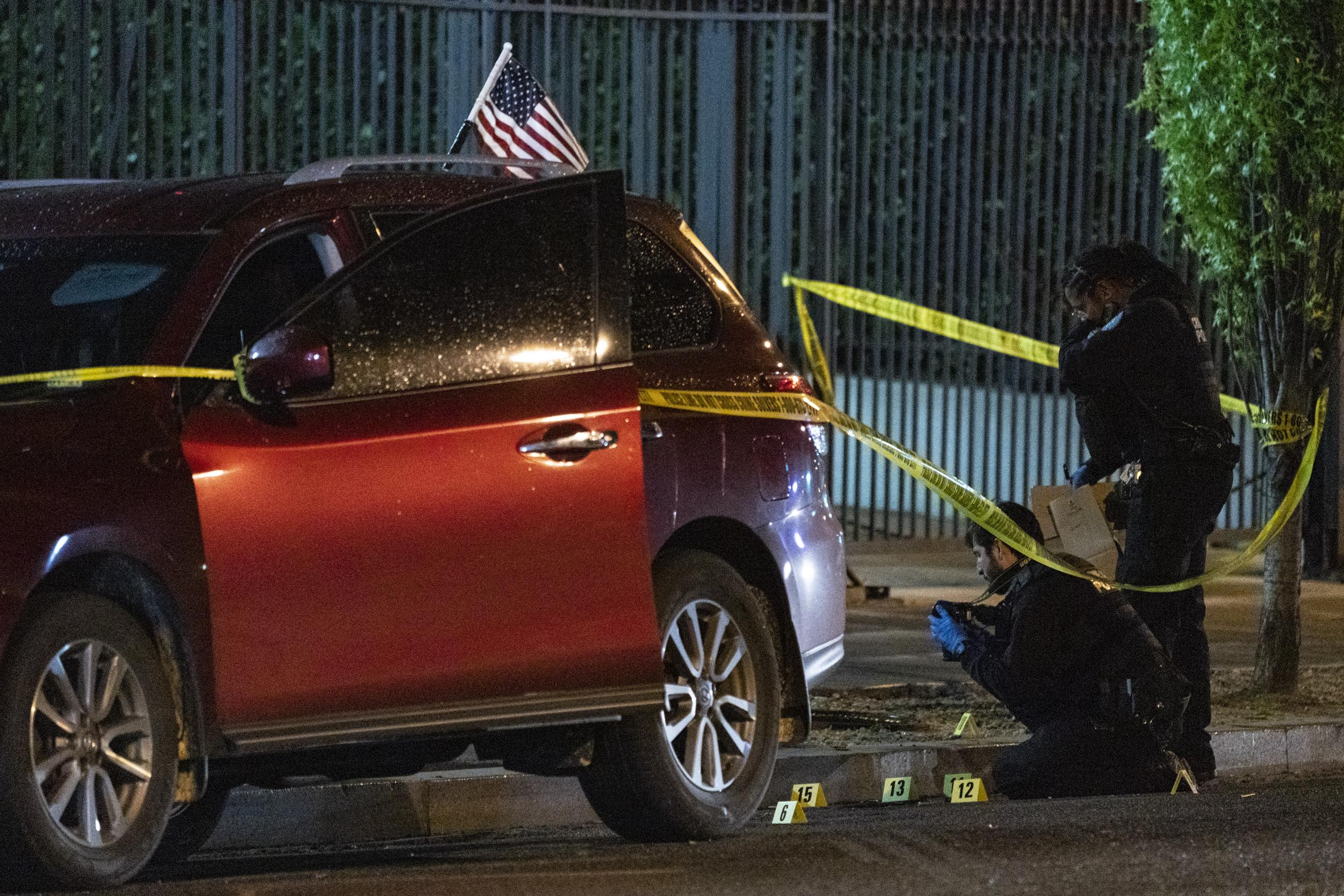 Police investigate the car of a shooter that opened fire on the Cuban Embassy on 30 April, 2020 in Washington, DC