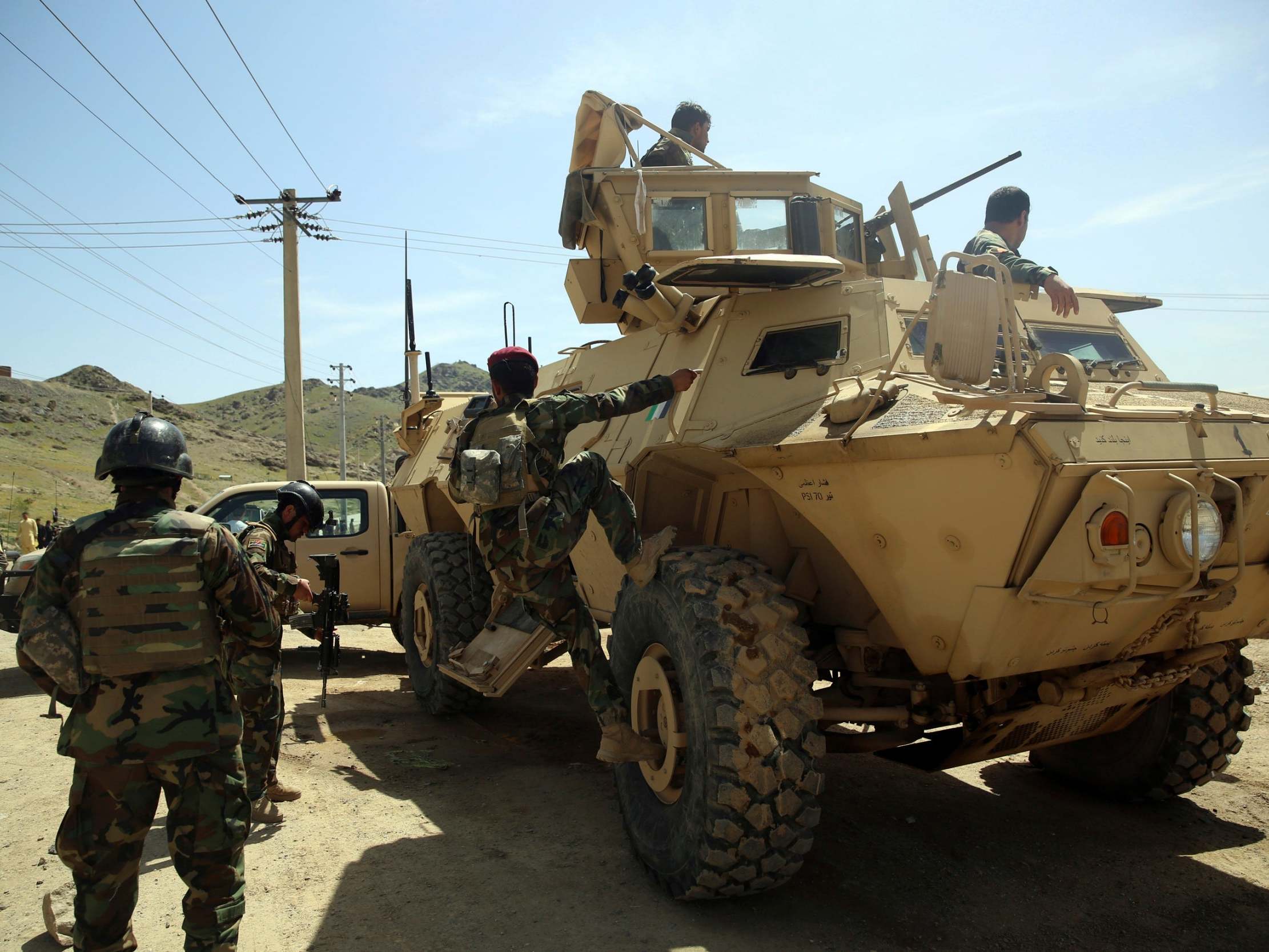 Afghan special forces stand guard at the site of a suicide bomber attack on 29 April on the outskirts of Kabul