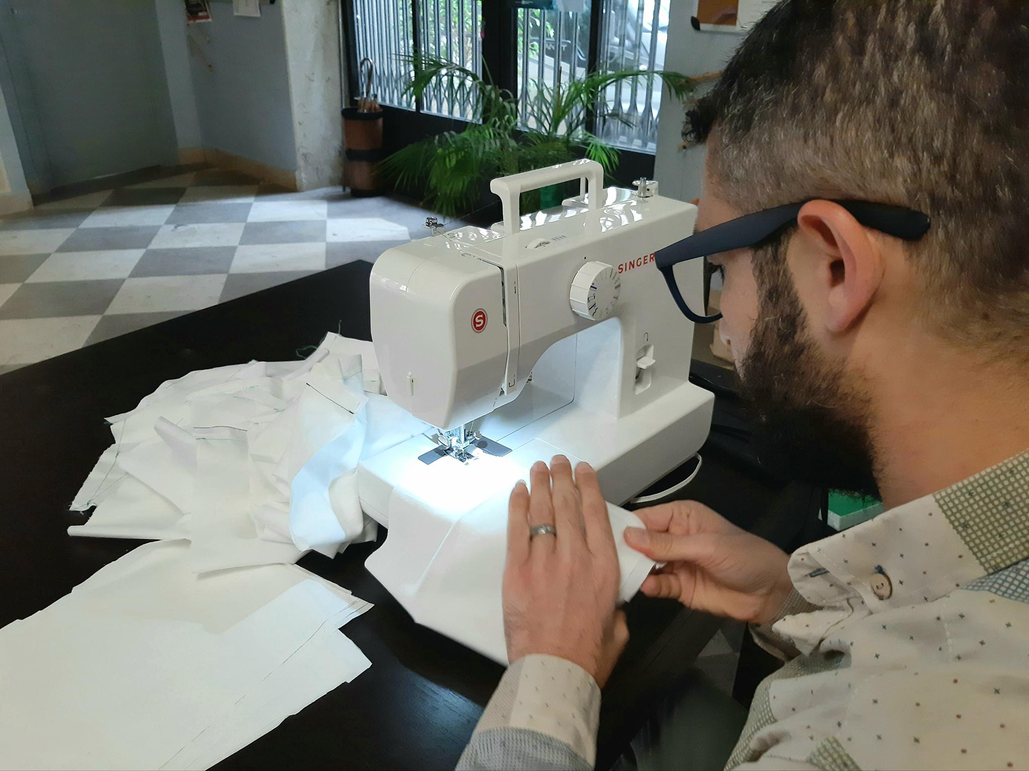 Refugee Mohamed al-Hassan was moved to make masks as the pandemic hit Italy