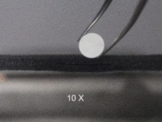 The scientists placed a 'pellet' of ceramic material between two strips of carbon, which can 'sinter' the material - making it resilient - in seconds