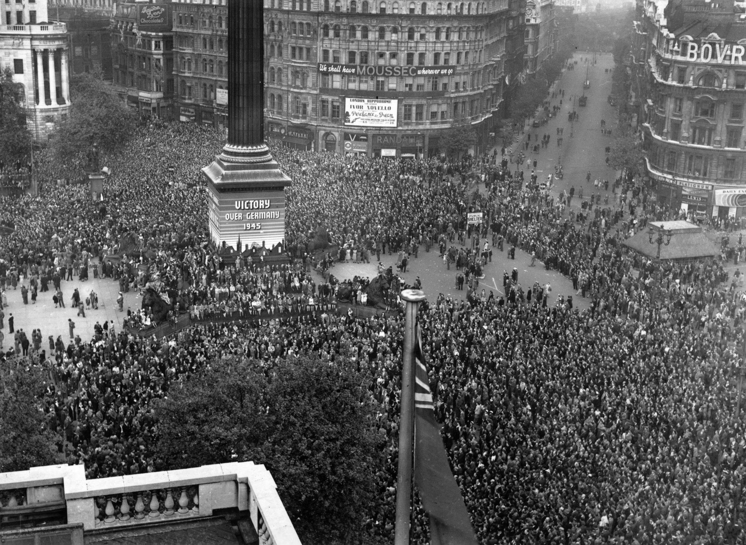 VE day, held to commemorate the official end of World War II in Europe, is celebrated by crowds at Trafalgar Square