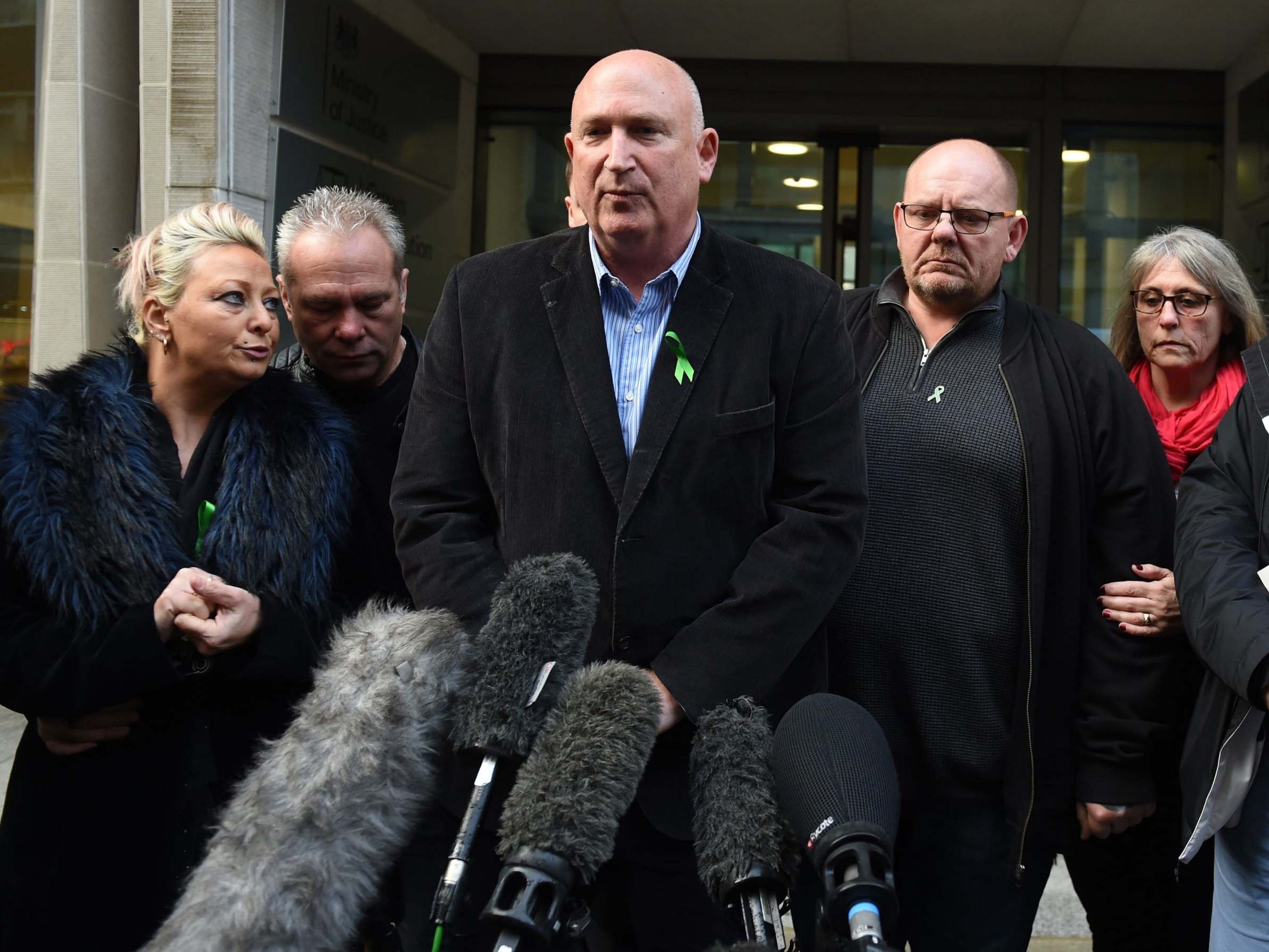 The family of Harry Dunn (left to right) mother Charlotte Charles, stepfather Bruce Charles, family spokesman Radd Seiger, father Tim Dunn and stepmother Tracey Dunn outside the Ministry Of Justice in London after meeting with the Director of Public Prosecutions.