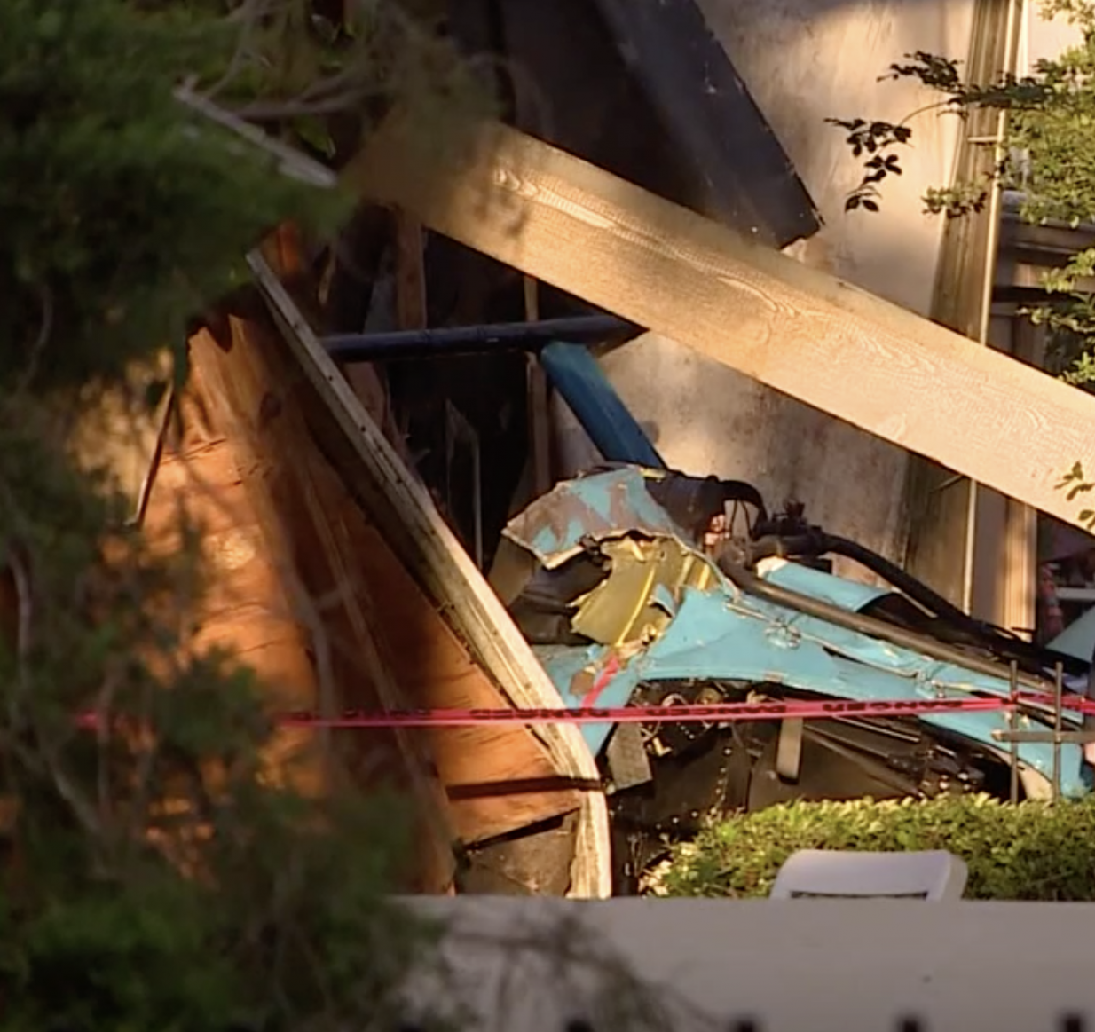 A police officer has died after a helicopter crashed into an apartment complex in Houston, Texas