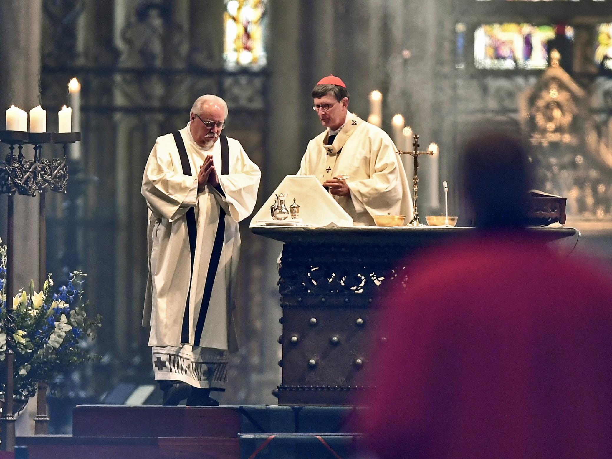 A church service is held at Germany’s Cologne Cathedral on 3 May 2020, after being closed for more than a month due to the coronavirus outbreak