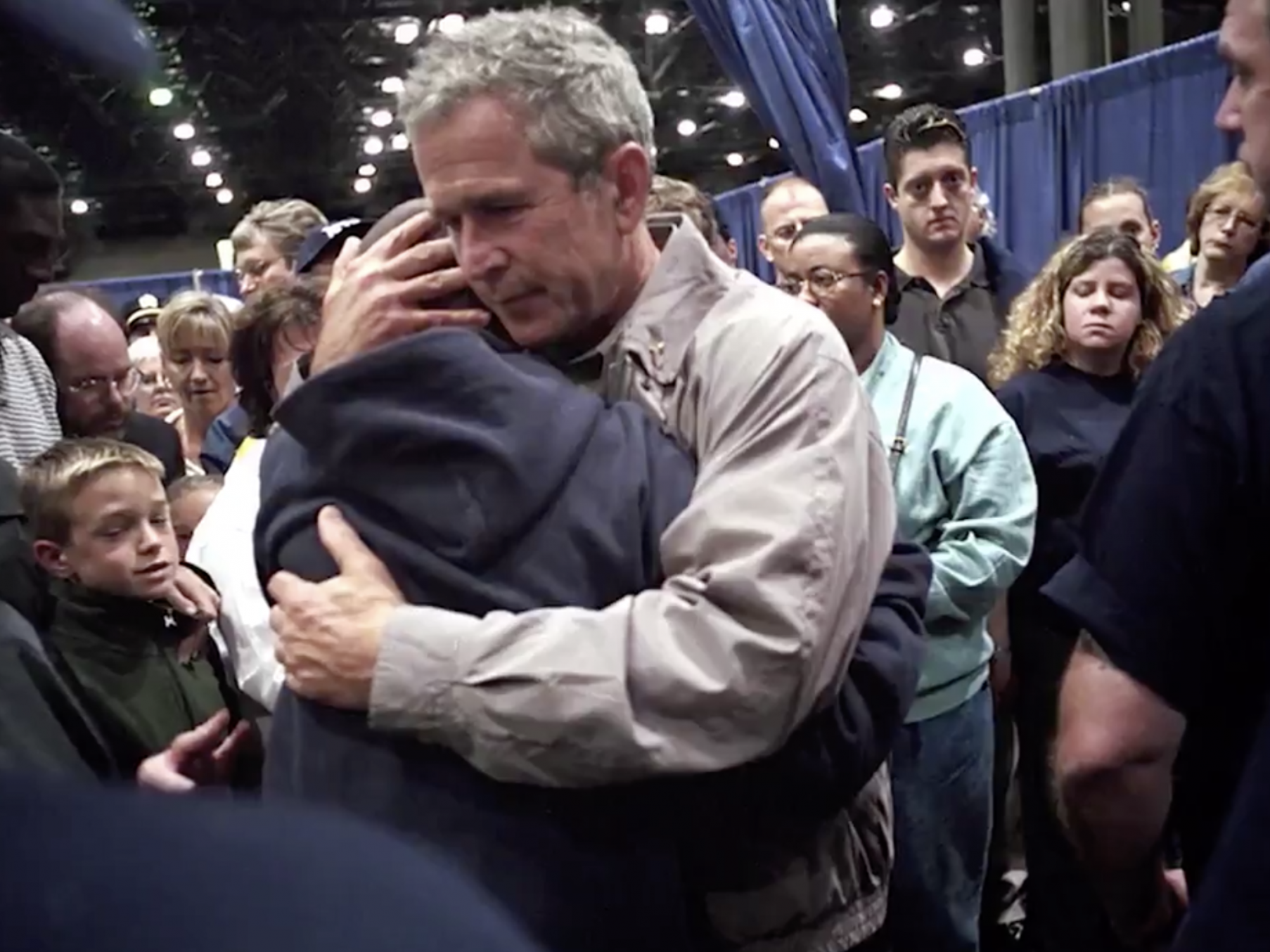 President George W. Bush consoles families of victims of the 9/11 terrorist attack in 2001, during a visit to New York City