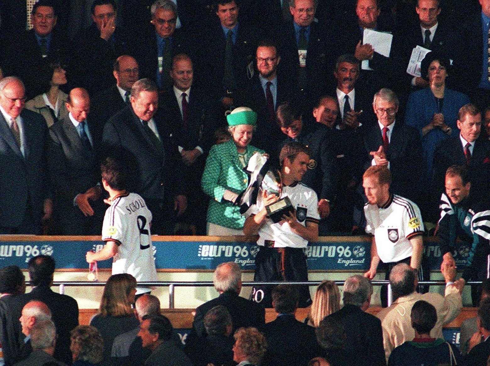 Queen Elizabeth presents Germany with the trophy