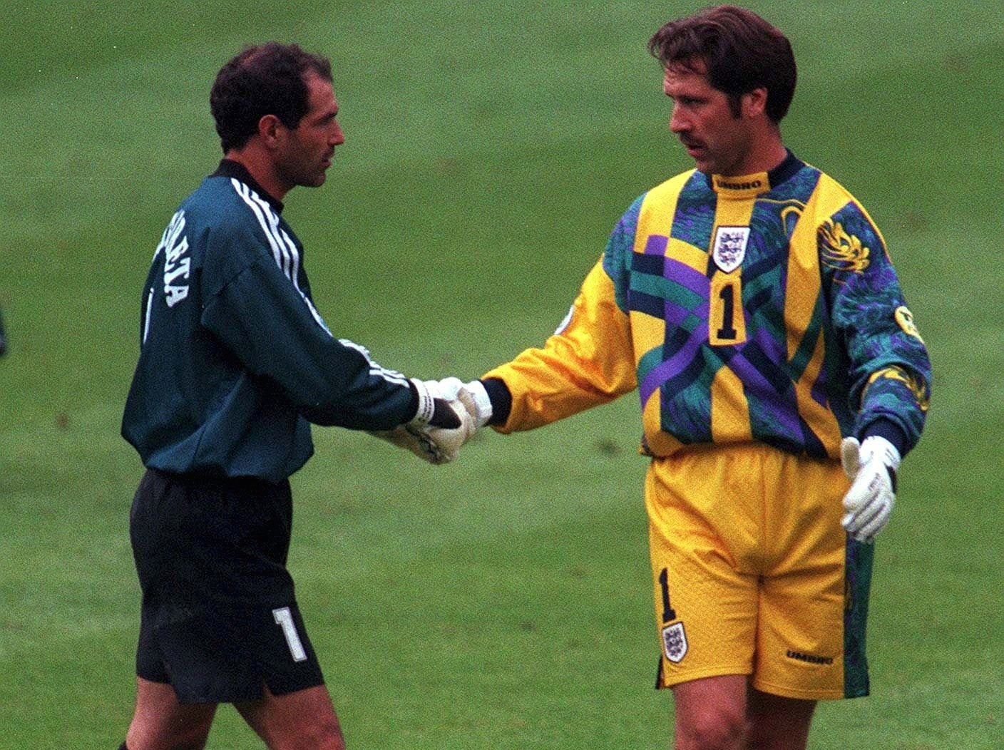 The goalkeepers shake hands