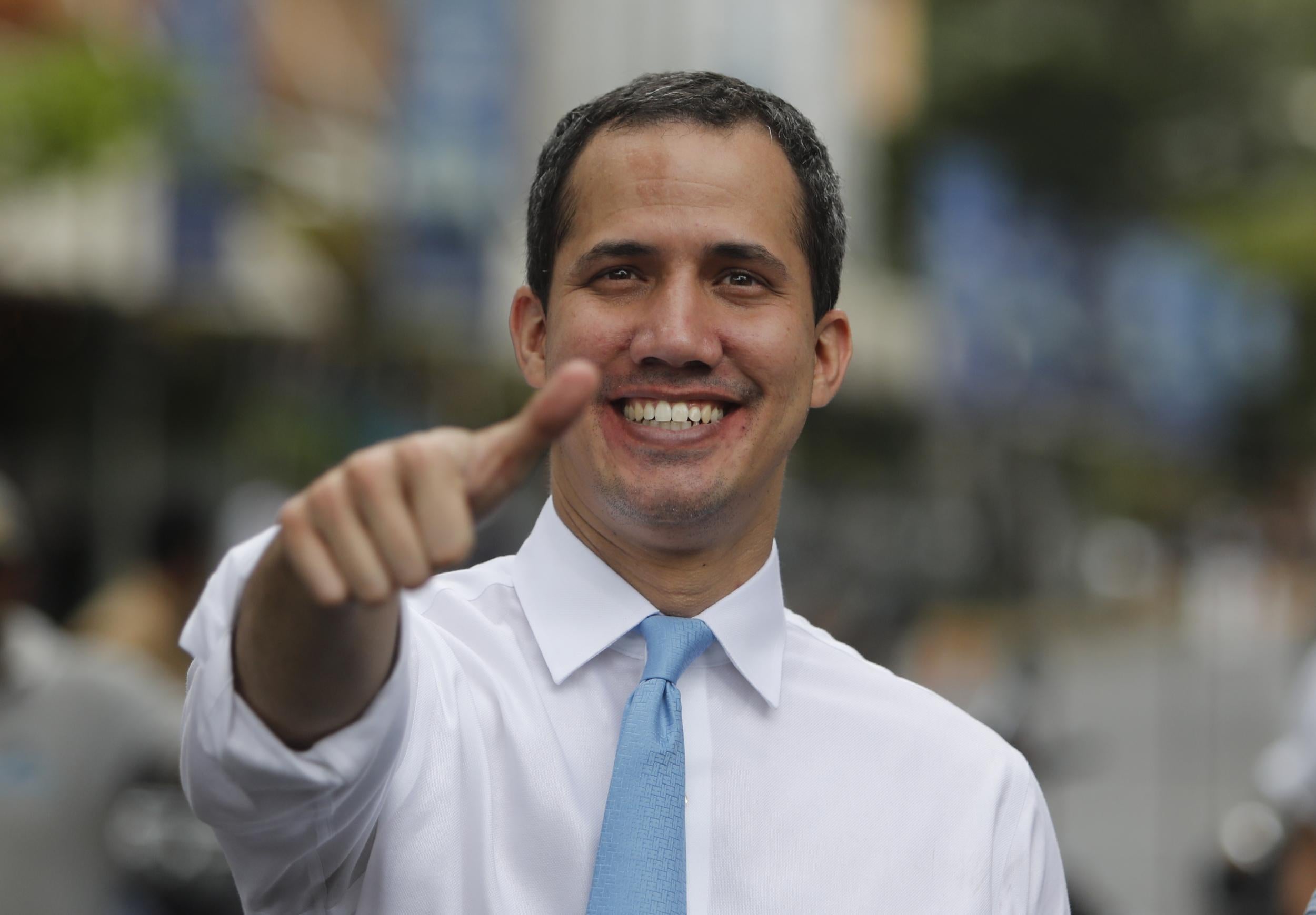 Venezuelan opposition leader Juan Guaido, recognised by many members of the international community as the country's rightful interim ruler, arrives at the session of the National Assembly in the Alfredo Sadel square in the east of the city