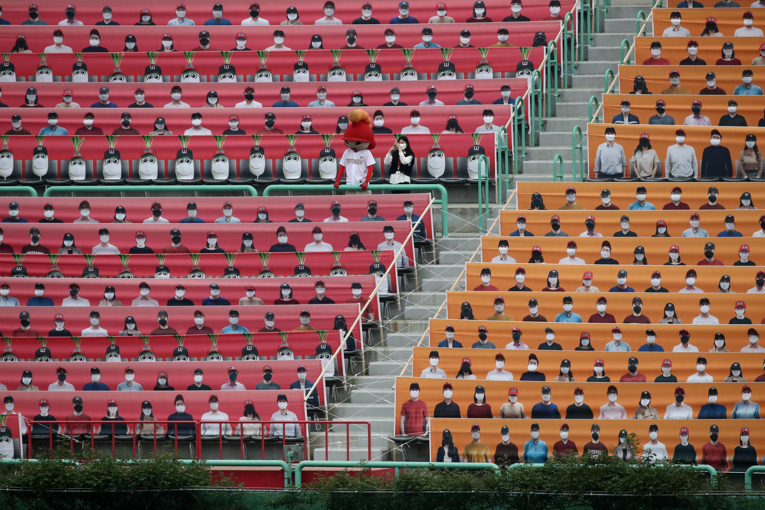 Stadiums are filled with photos of fans (Getty)